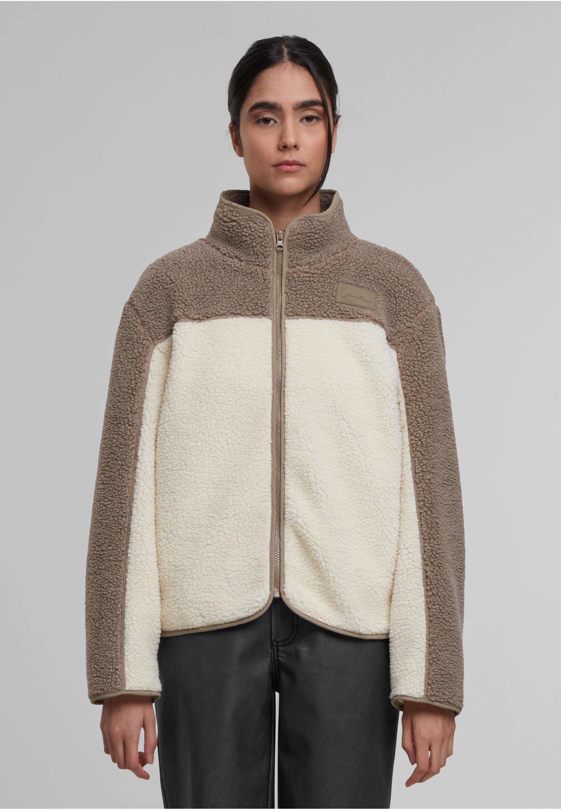 Karl Kani Trainingsjacke »Karl Kani Signature Teddy Trackjacket« 1 Stk. tlg. ohne Kapuze