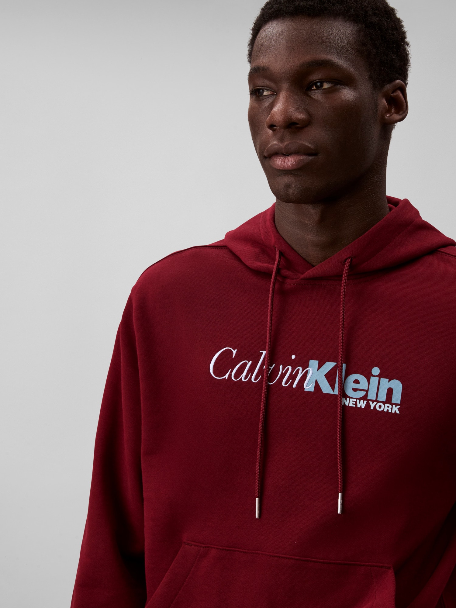 Calvin Klein Kapuzensweatshirt »LS EU 350TERRY CURSIVE GRAPHIC H«, regular fit, Logo-Schriftzug