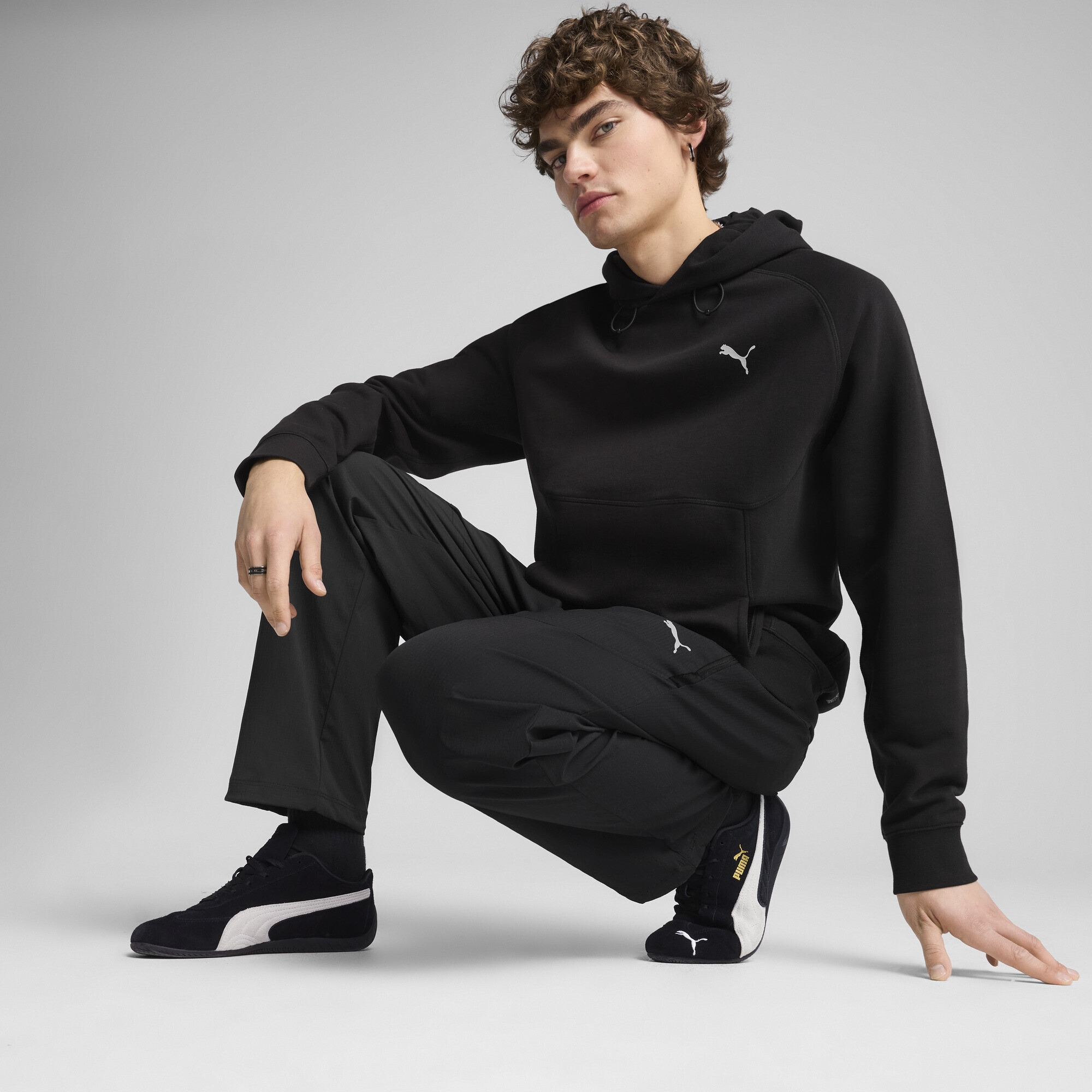 PUMA Hoodie »PUMATECH DELTAKNIT Relaxed Hoodie Herren«