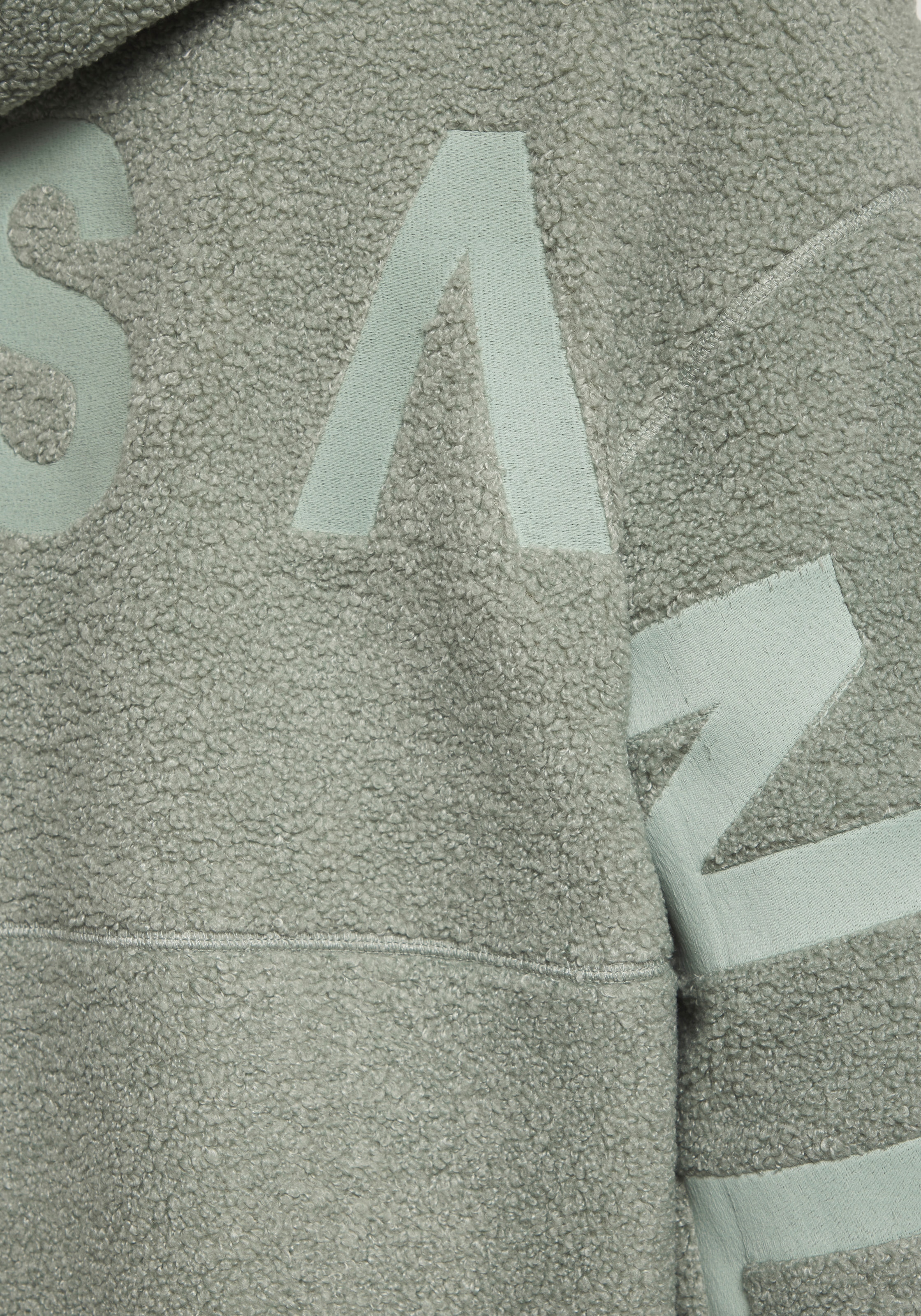 Elbsand Fleecepullover , mit großem Letterprint auf dem Rücken
