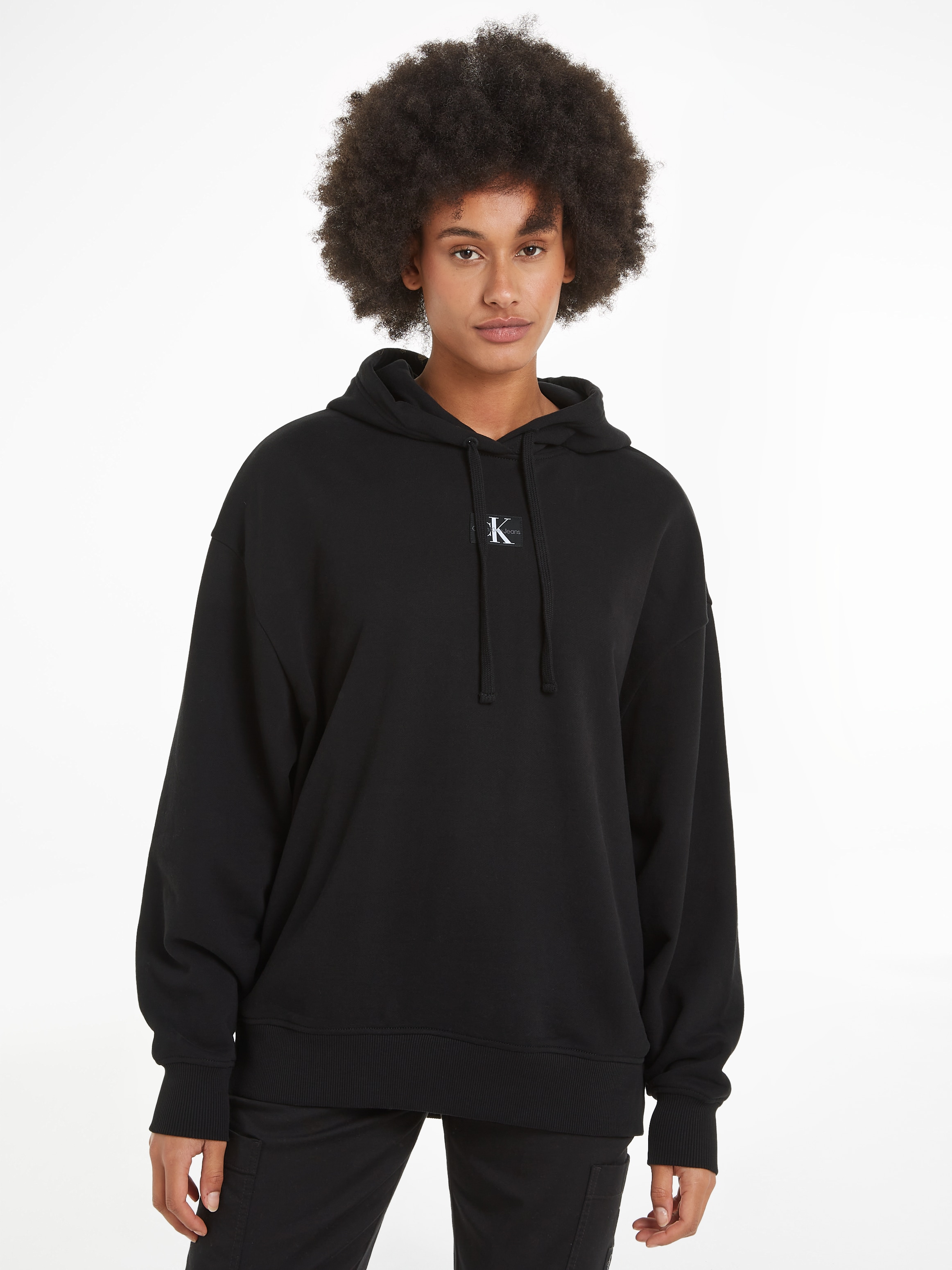 Calvin Klein Jeans Longsweatshirt "WOVEN LABEL OVERSIZED HOODIE", mit Logopatch