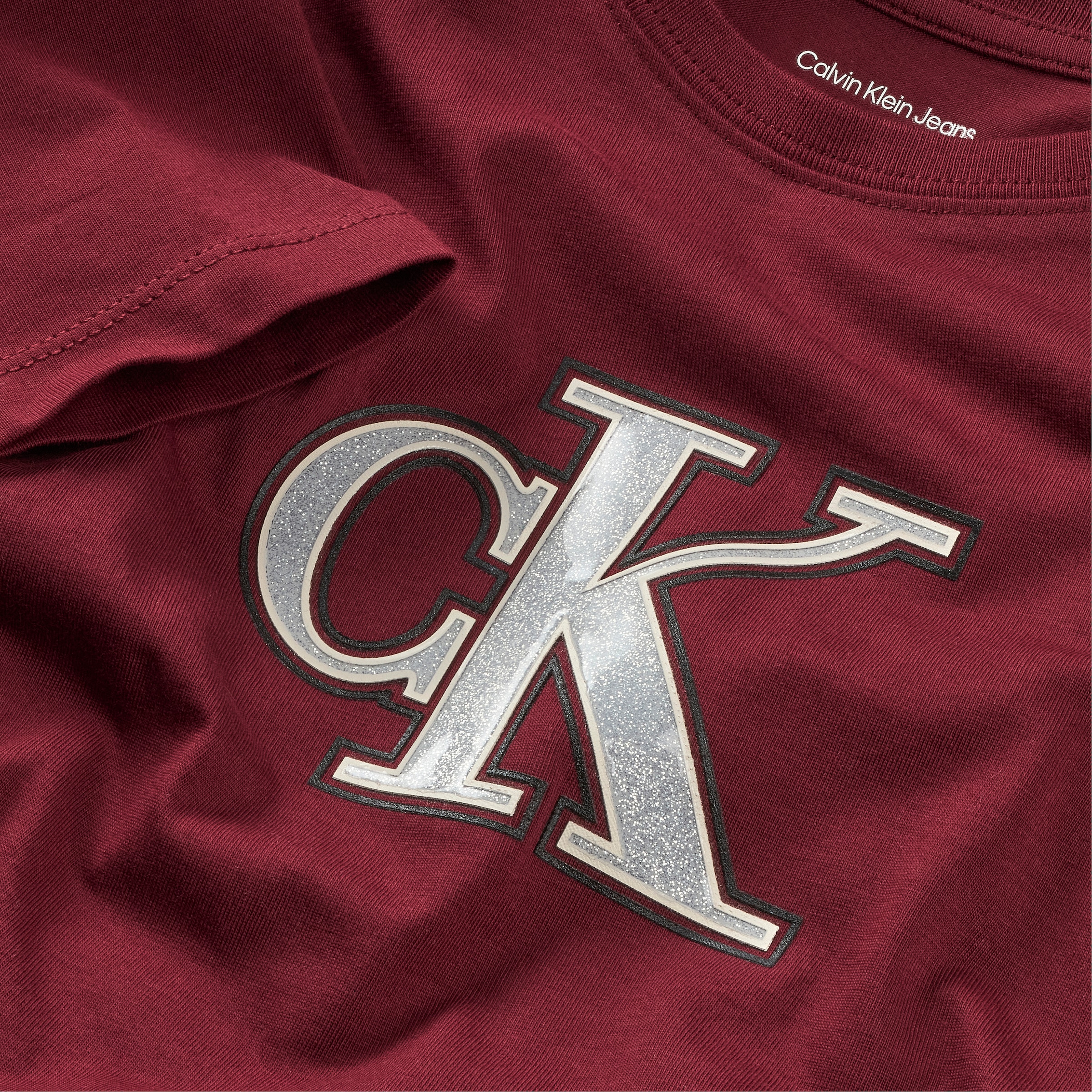 Calvin Klein Jeans T-Shirt »FESTIVE GRAPHIC SS T-SHIRT«, für Kinder bis 16 Jahre, Glitzer-Druck