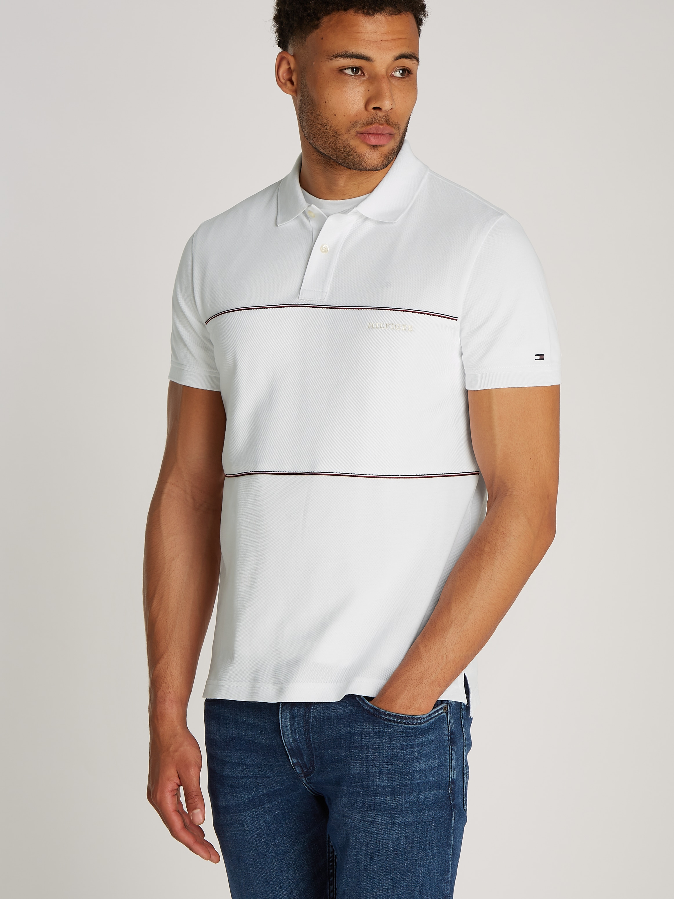 Tommy Hilfiger Poloshirt »GLOBAL STRIPE BLOCKING REG POLO«, mit Logo-Stickerei und Logo-Streifen