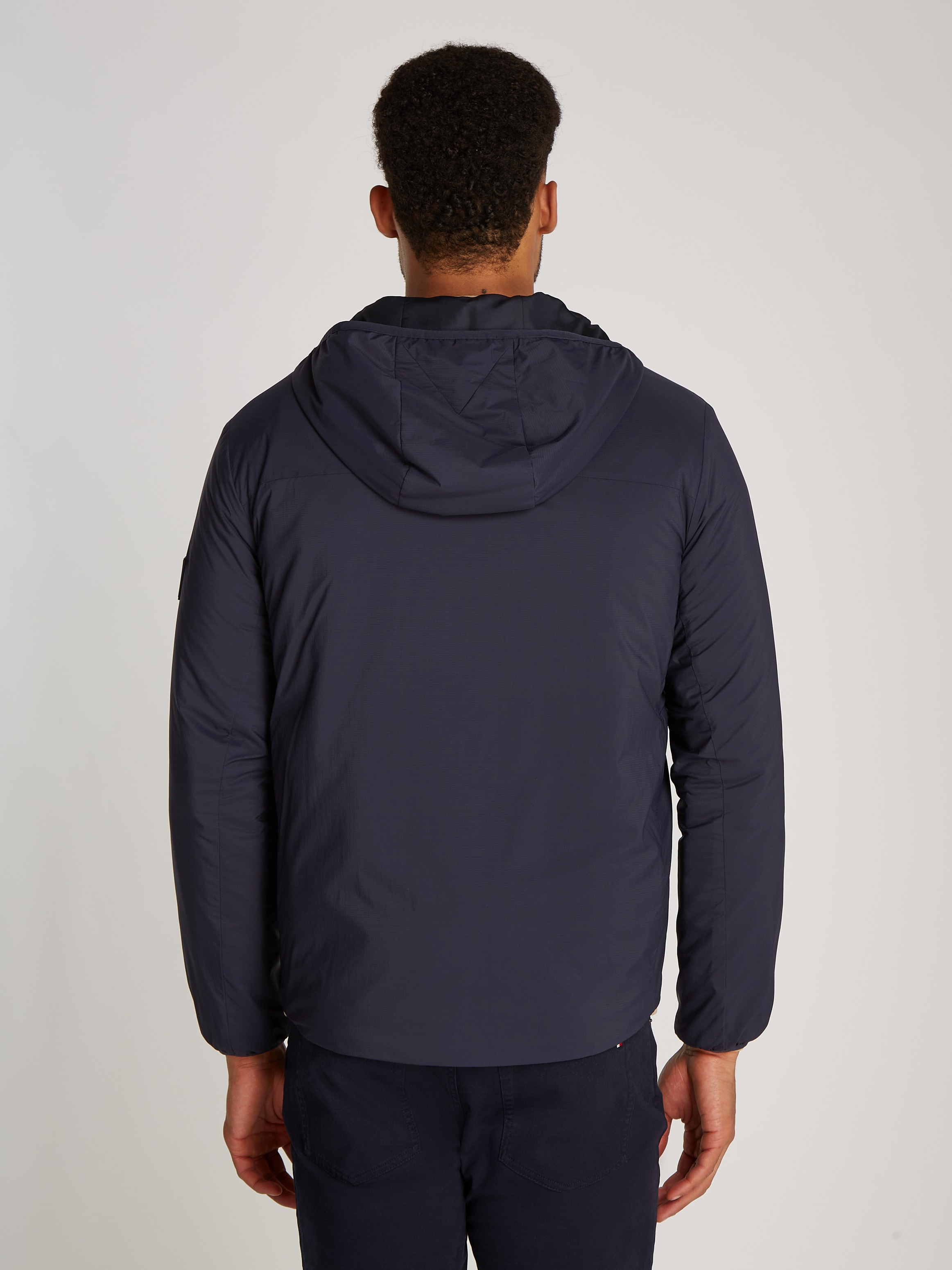 Tommy Hilfiger Kurzjacke "TECH PACKABLE HOODED JACKET", mit Kapuze, mit Log günstig online kaufen