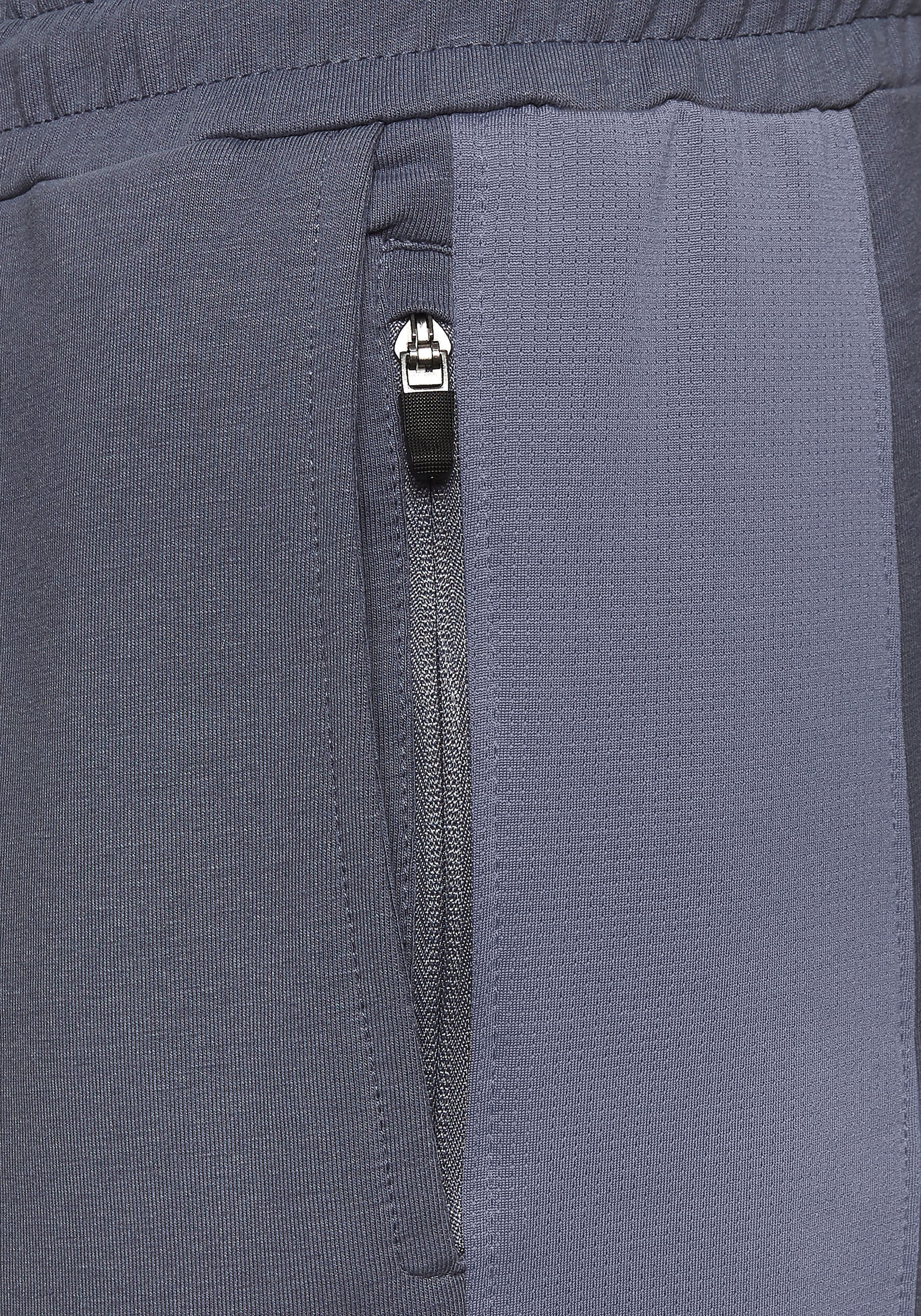 le jogger® Sweatpants  mit farblichen Einsatz und Reißverschlusstaschen