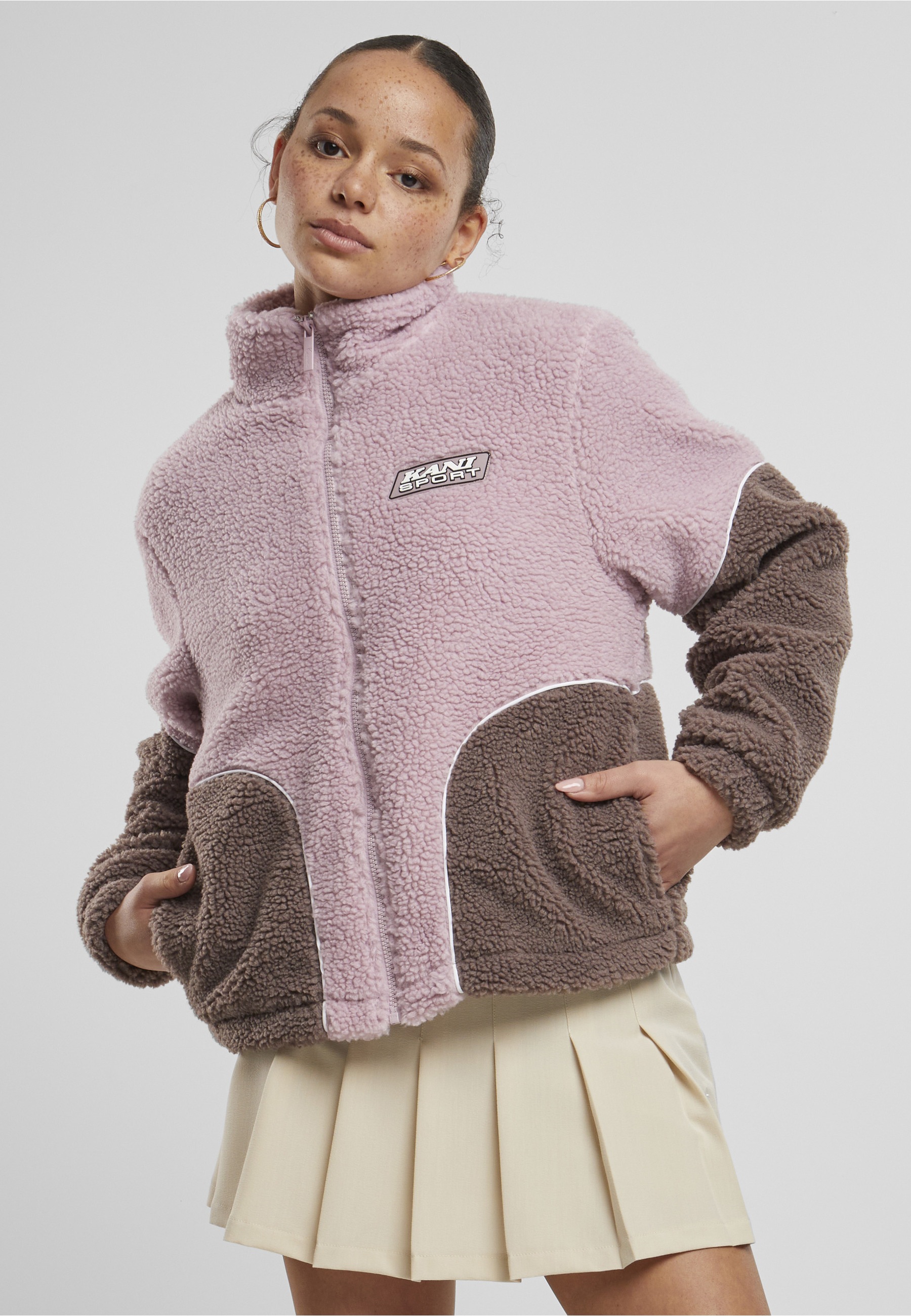 Karl Kani Trainingsjacke »Karl Kani Karl Kani Sport Patch Teddy Block Trackjacket« 1 Stk. tlg. ohne Kapuze