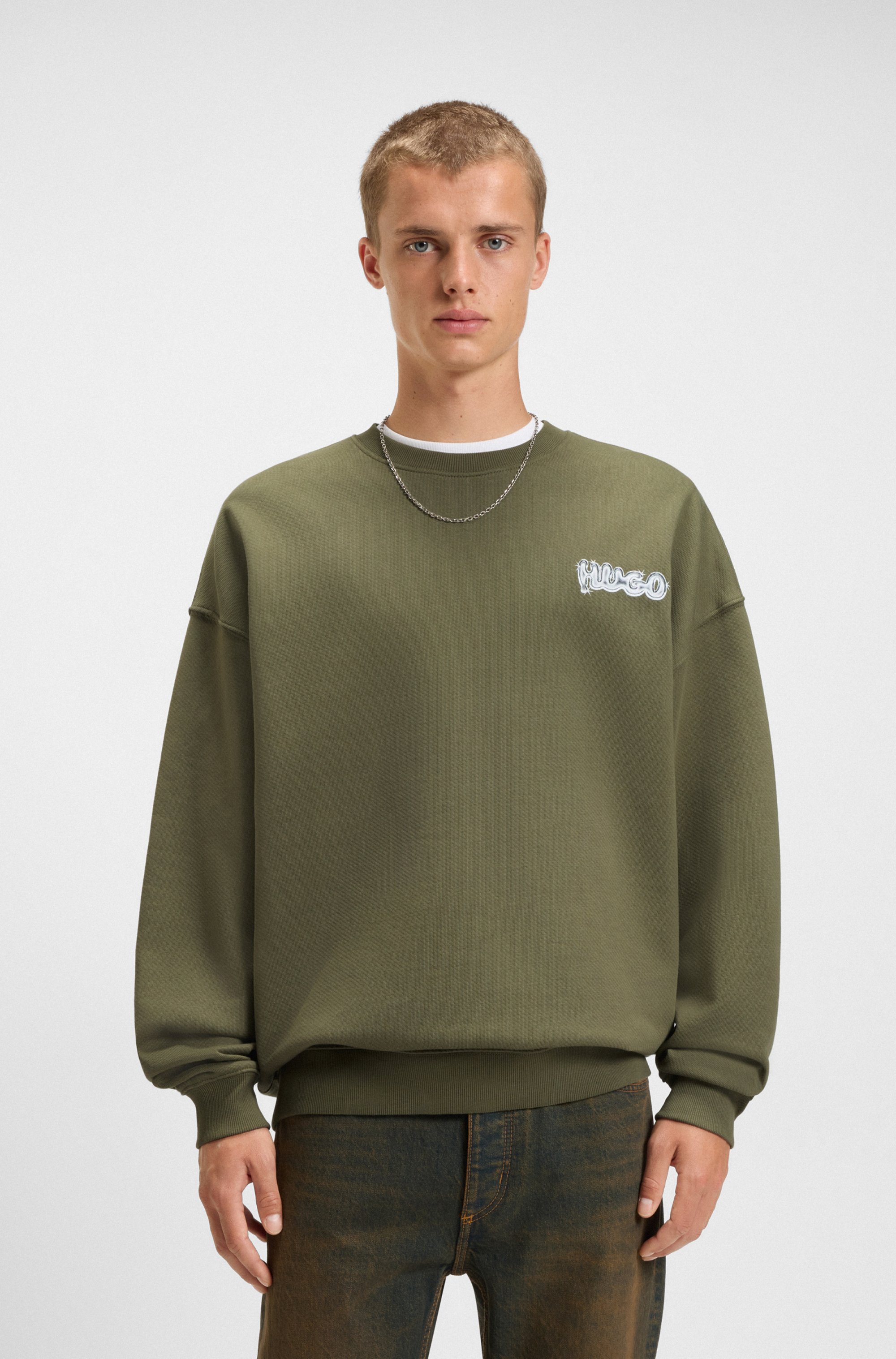 HUGO Sweatshirt "Nyrocrew", Rückenaufdruck in Chrom-Optik, Rundhalsausschnitt, Loose fit