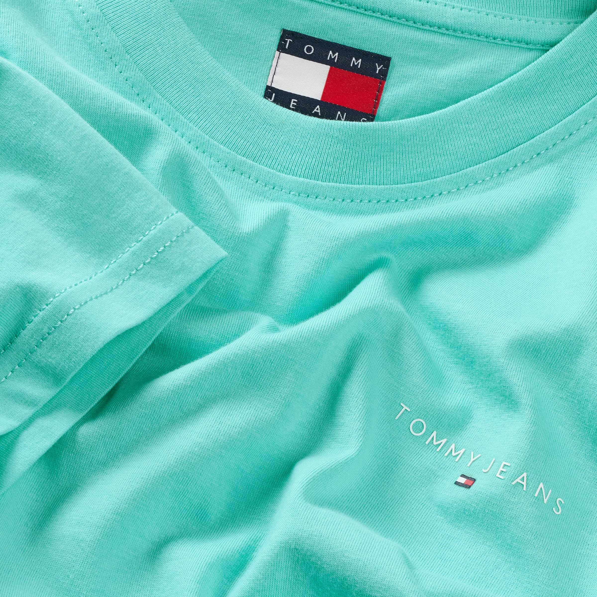 Tommy Jeans T-Shirt »TJM SLIM LINEAR CHEST TEE EXT«, Mit Rundhalsausschnitt