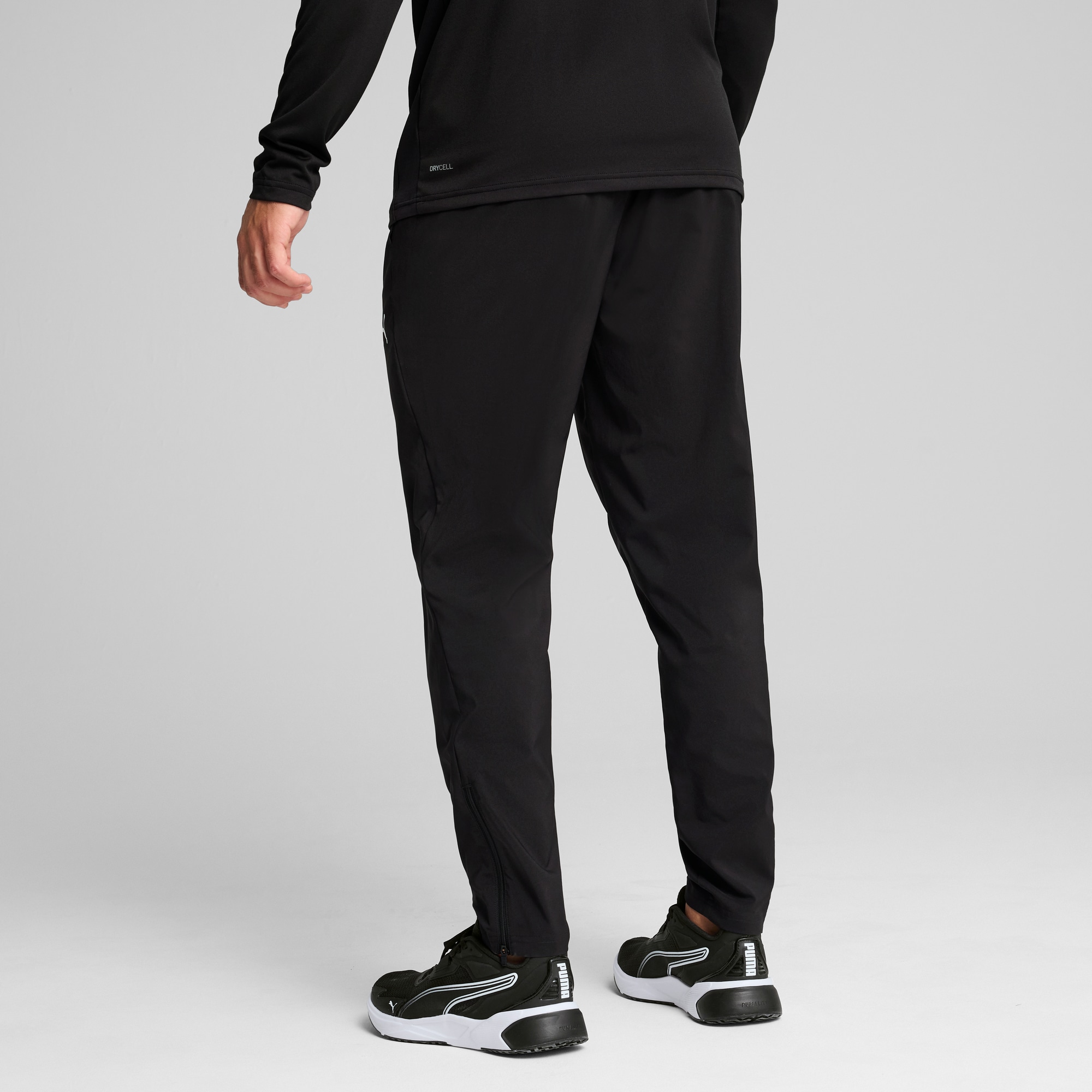 PUMA Trainingshose »M TAD ESSENTIALS WOVEN TAPERED PANT«