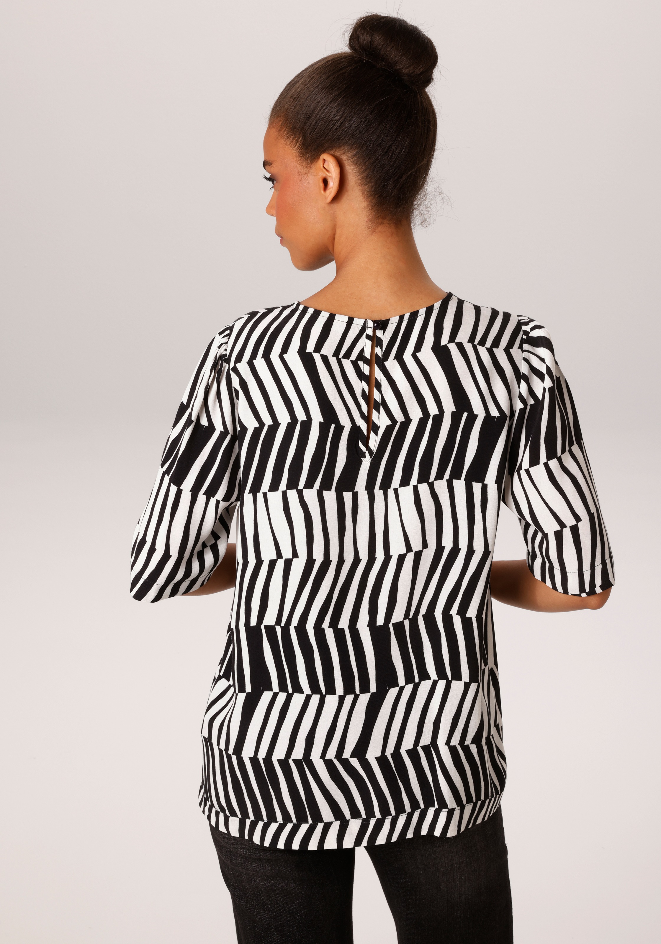 Aniston CASUAL Schlupfbluse mit extravagantem Streifenmuster - NEUE KOLLEKT günstig online kaufen