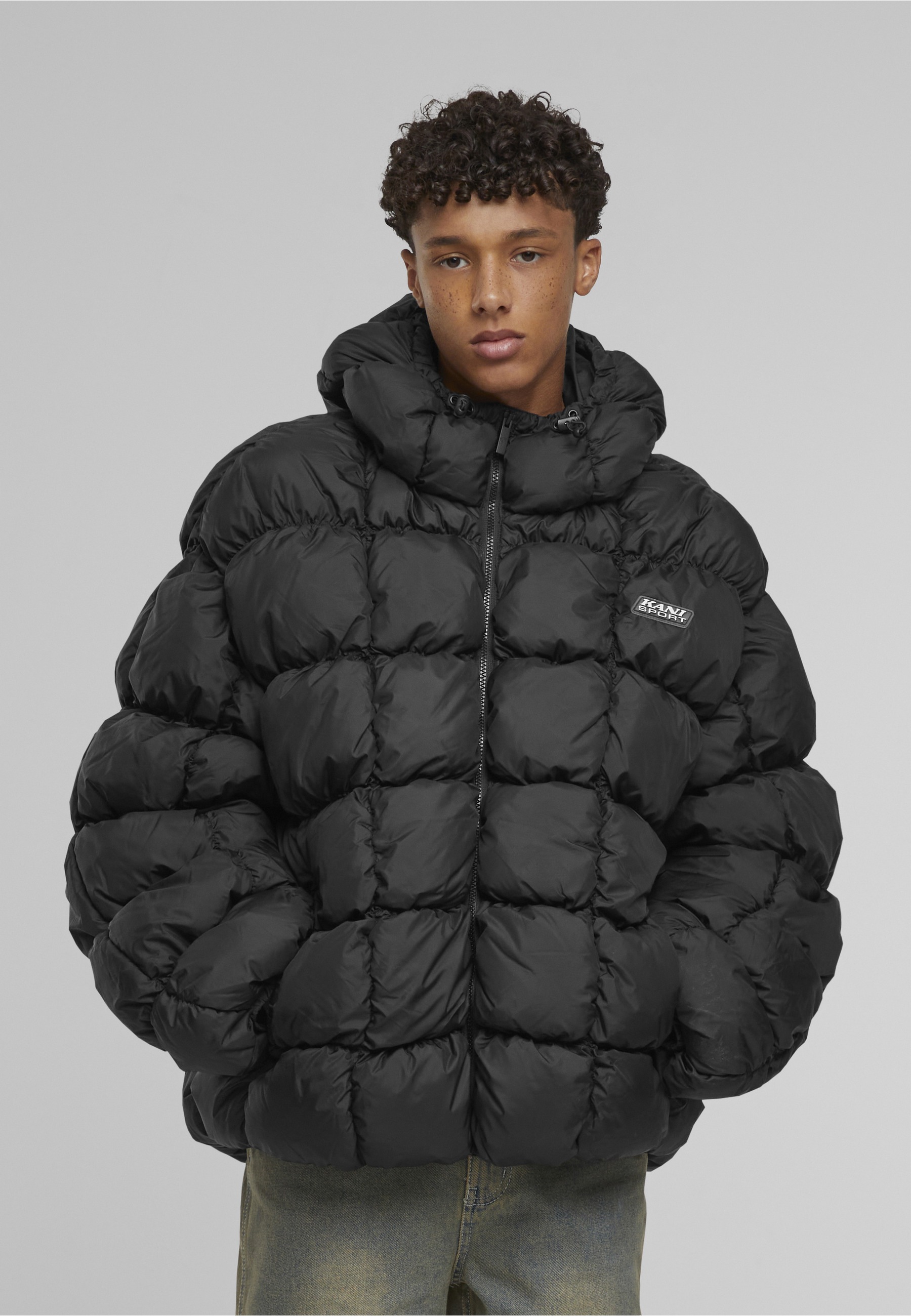Thumbnail - Karl Kani Winterjacke "Karl Kani Karl Kani Sport Patch Square Quilted Puffer Jacket" 1 Stk. tlg. ohne Kapuze
