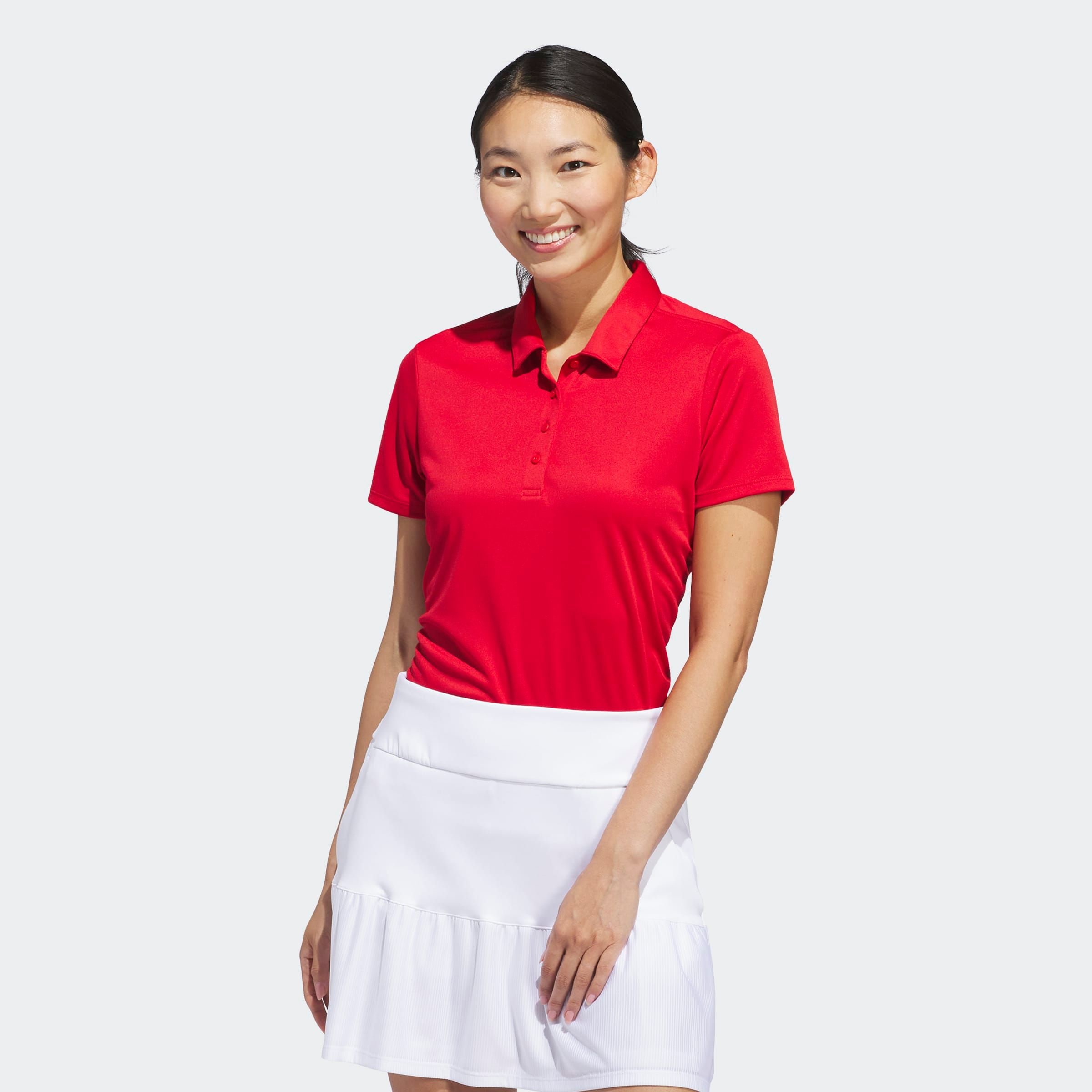 adidas Performance Poloshirt "SOLID PERFORMANCE SLEEVE FÜR DAMEN" mit Druckknopfverschluss, aus Polyester, leichtes Pikeematerial