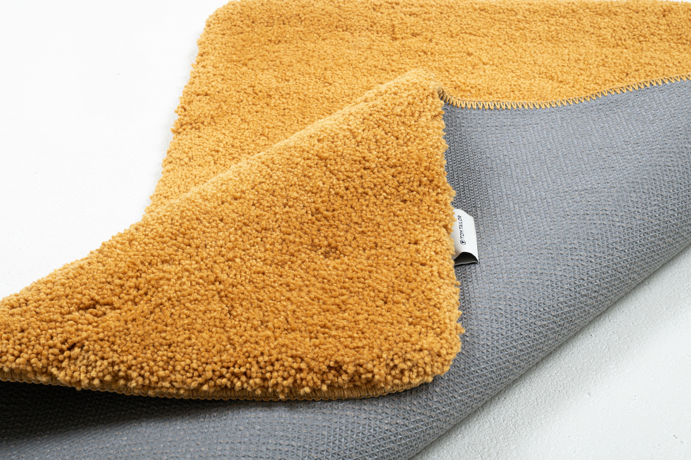 TOM TAILOR Badematte »Cozy Bath UNI«, rutschhemmend beschichtet, fußbodenheizungsgeeignet, Badteppich, Uni Farben, rechteckig, rund und oval erhältlich