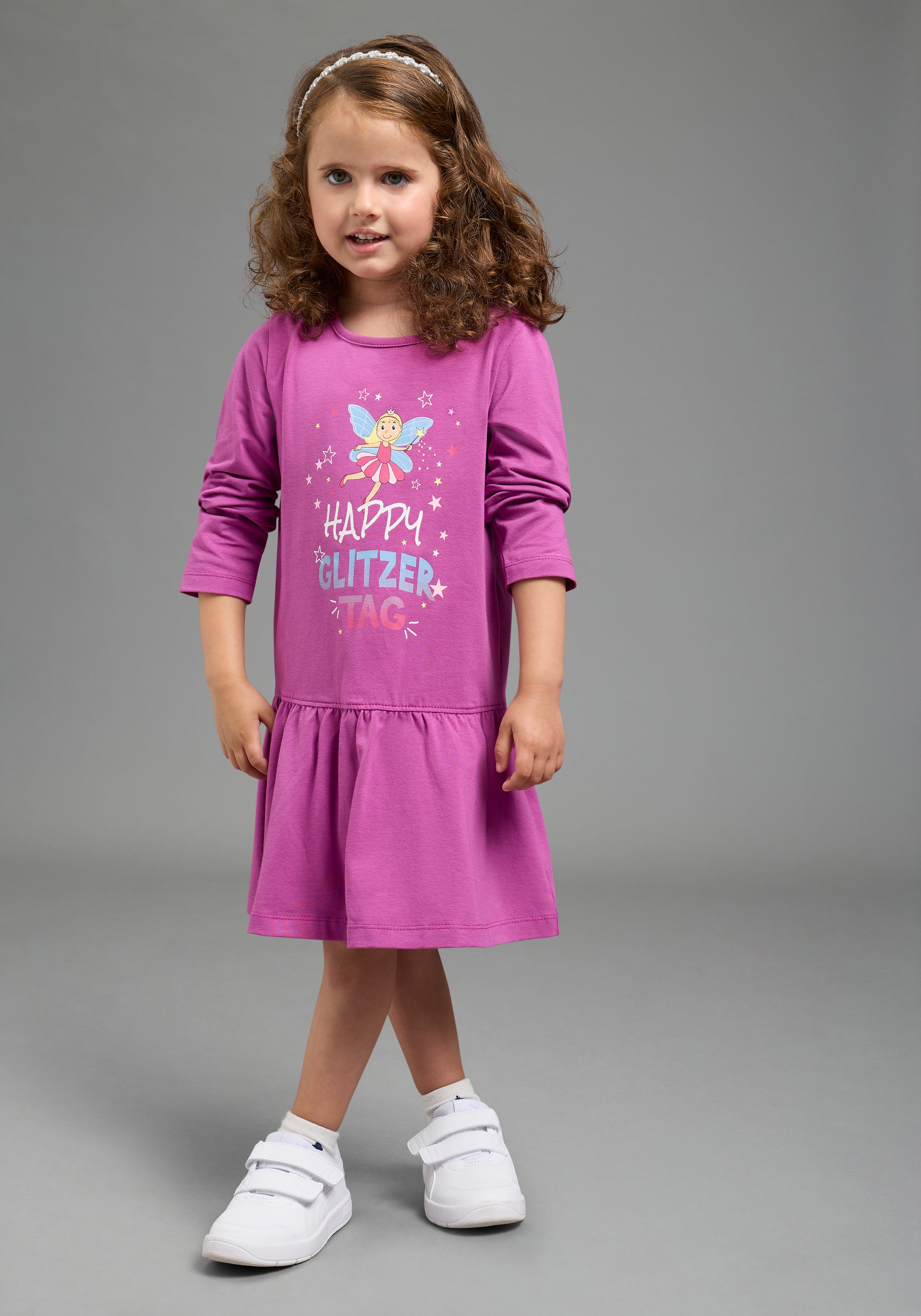 KIDSWORLD Jerseykleid "mit Spruch: HAPPY GLITZER TAG" Shirtkleid mit Feenprint, kniefreie Länge, verspielter Look