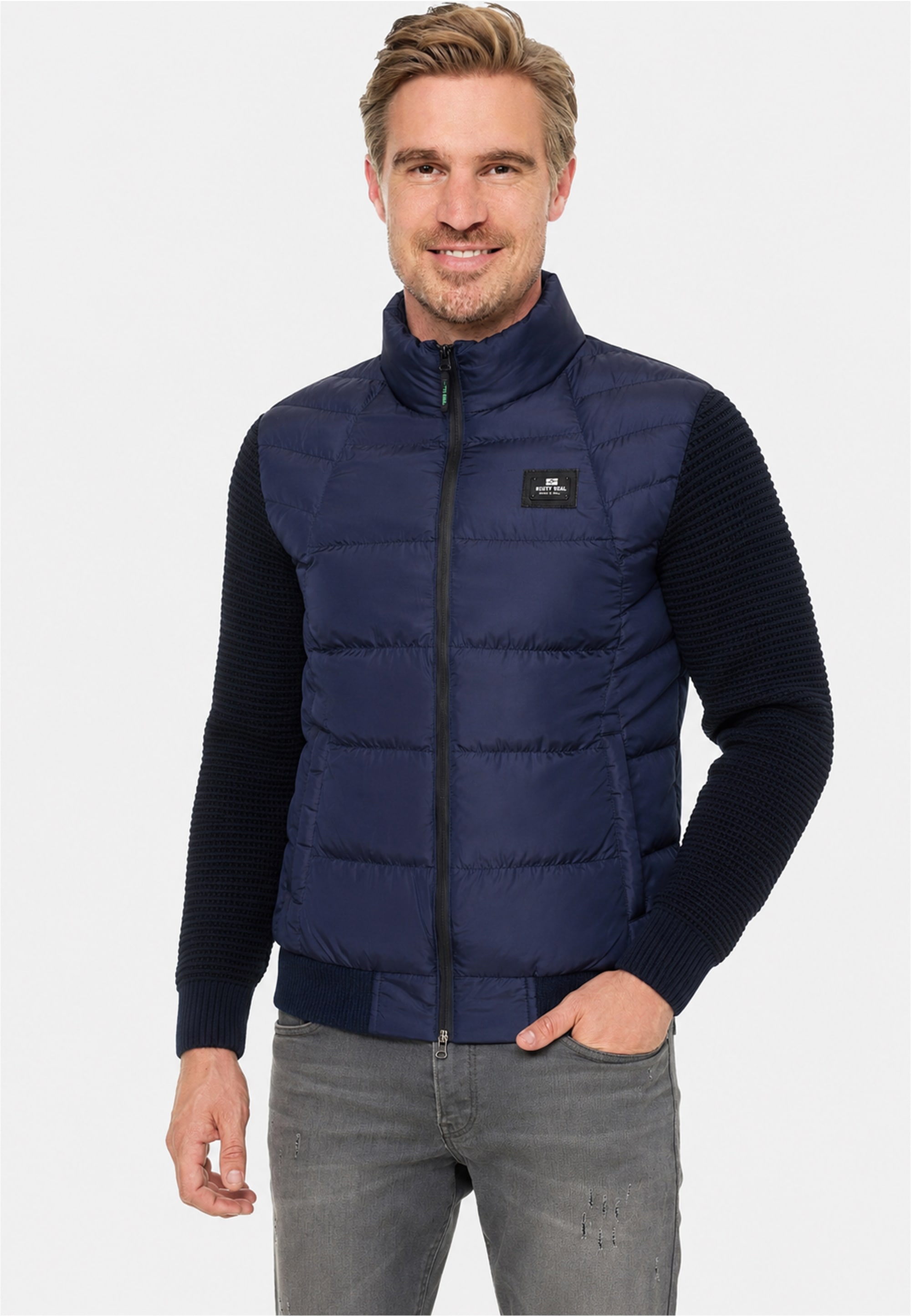 Rusty Neal Steppjacke »Uni« mit Strickärmeln im College-Look
