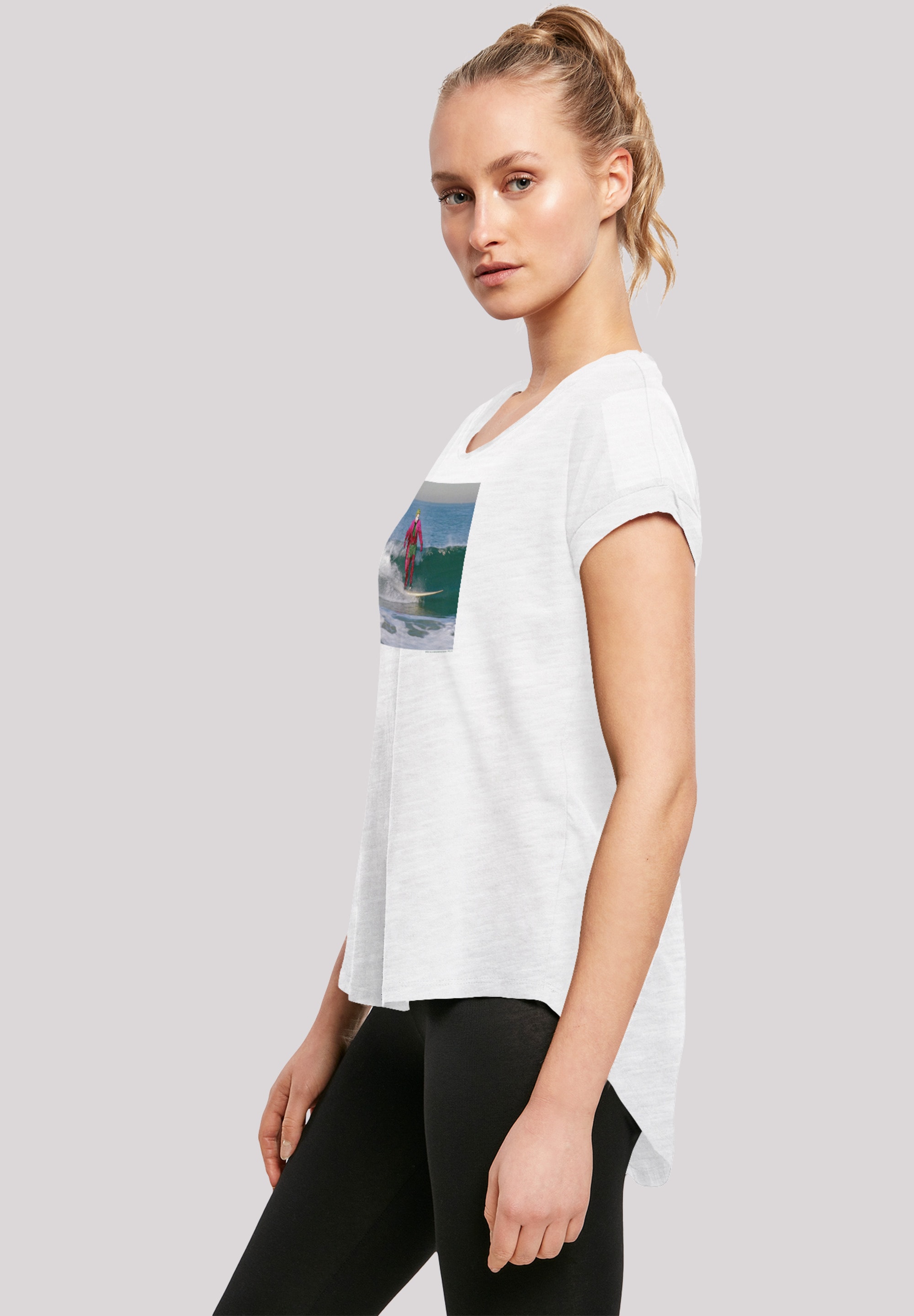 F4NT4STIC T-Shirt »Long Cut T-Shirt 'Batman TV Serie Joker Surfing'«, Damen,Premium Merch,Lang,Longshirt,Bedruckt
