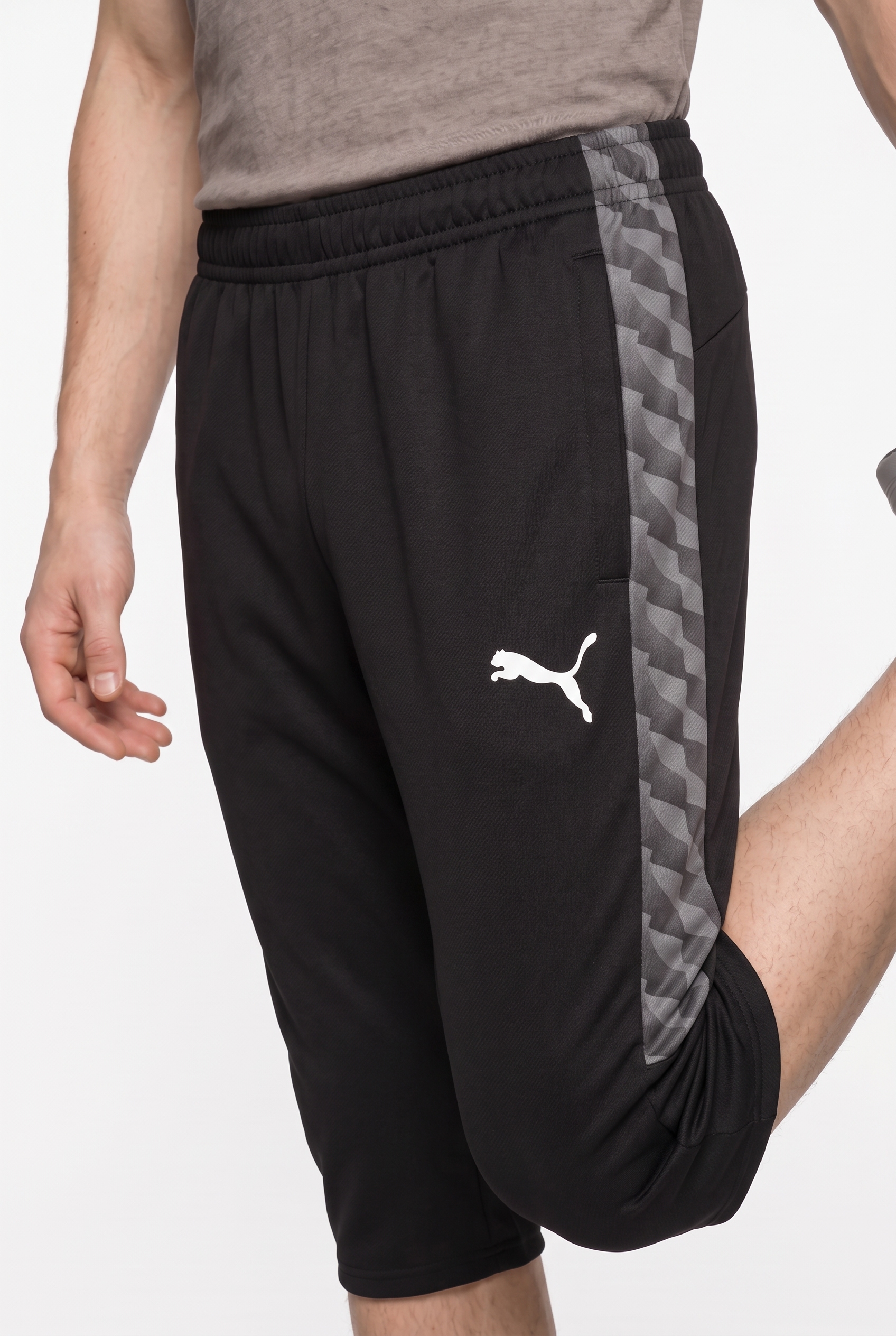 PUMA Trainingshose »TEAMLIGA26 TRAINING 34 PANTS«  atmungsaktives Material, mit Reißverschlusstaschen