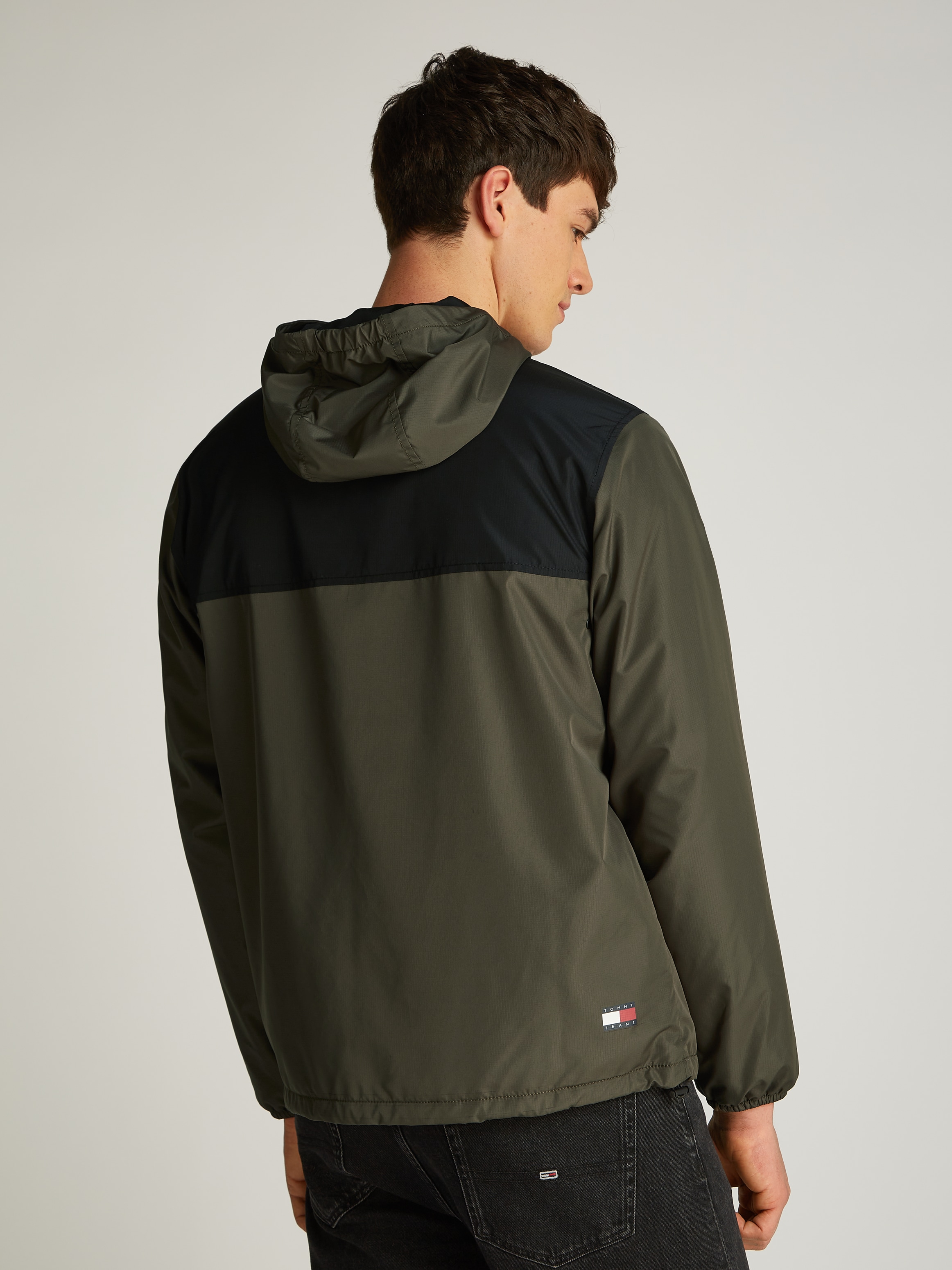 Tommy Jeans Windbreaker »TJM FLEECE LINED CHICAGO JACKET«, mit Kapuze, mit Fleece-Futter