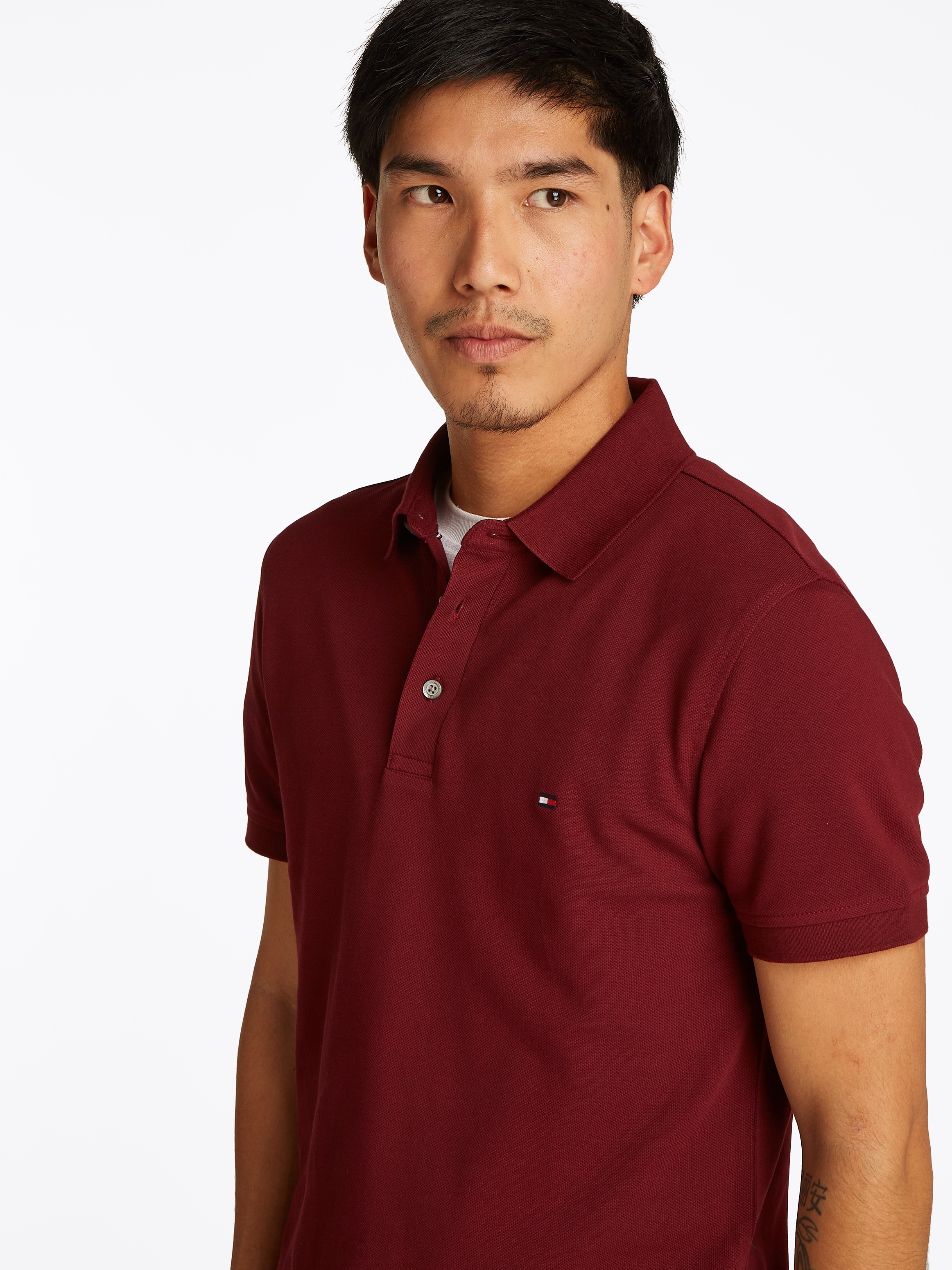 Tommy Hilfiger Poloshirt »1985 SLIM POLO«, aus leicht strukturiertem Piqué-Material