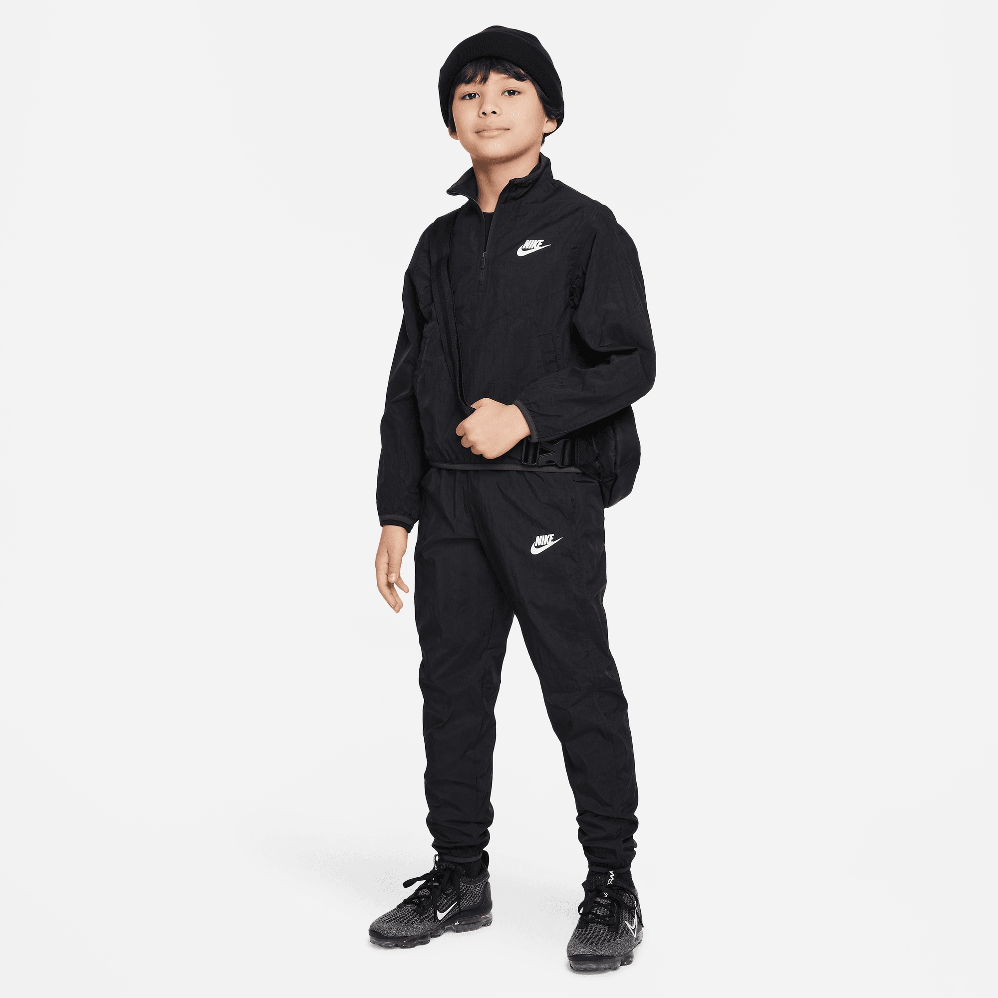 Black nike tracksuit junior deals