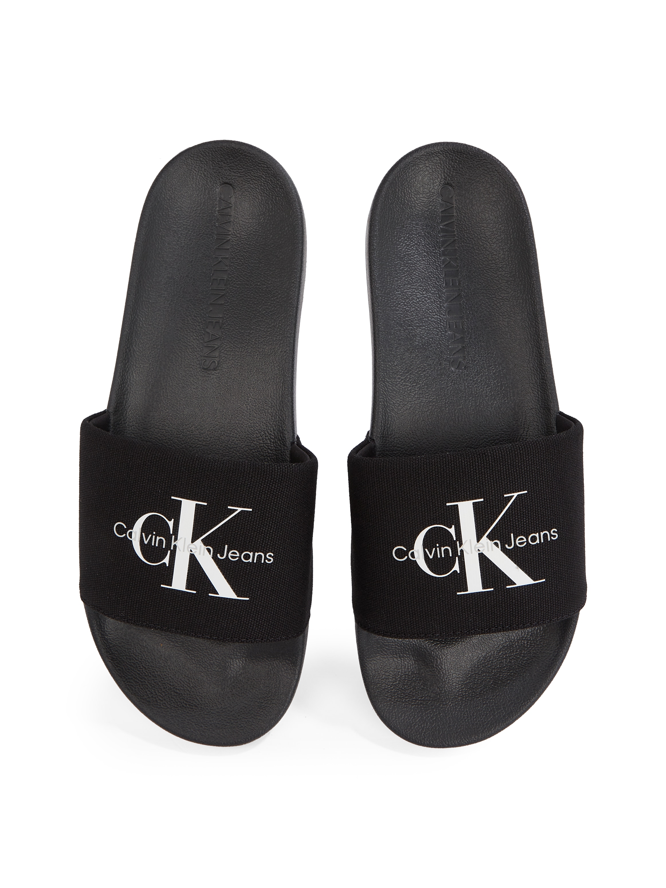 Calvin Klein Jeans Badepantolette »SLIDE MONOGRAM«, Sommerschuh, Schlappen, Poolslides, Strandschuh mit Logoschriftzug
