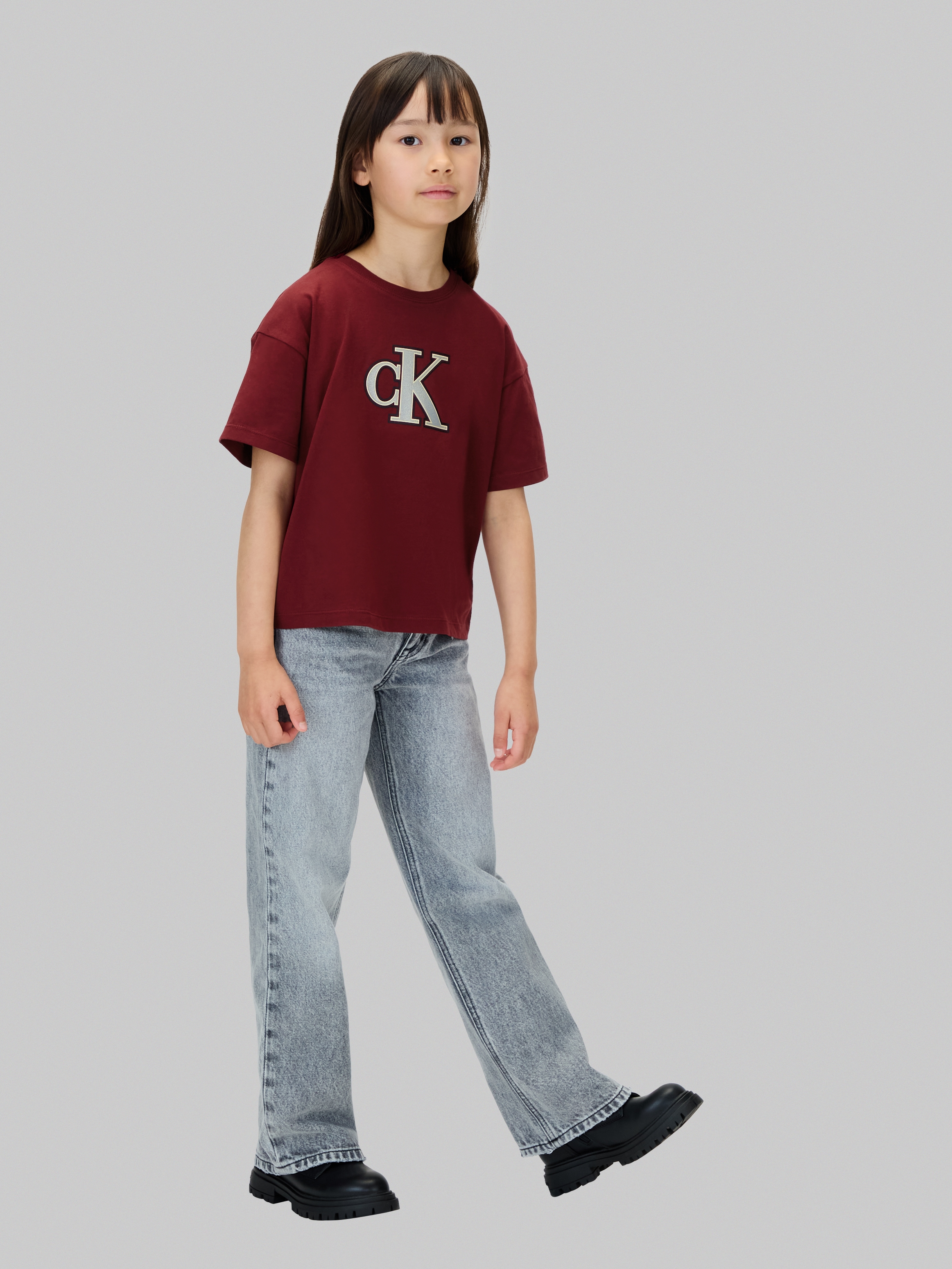 Calvin Klein Jeans T-Shirt »FESTIVE GRAPHIC SS T-SHIRT«, für Kinder bis 16 Jahre, Glitzer-Druck
