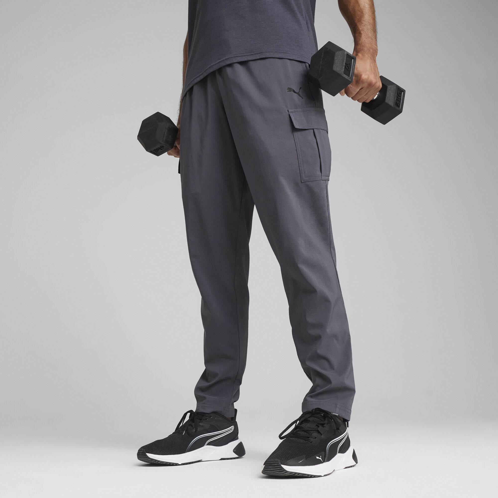 PUMA Trainingshose »TAD TECH Gewebte Cargohose Herren«