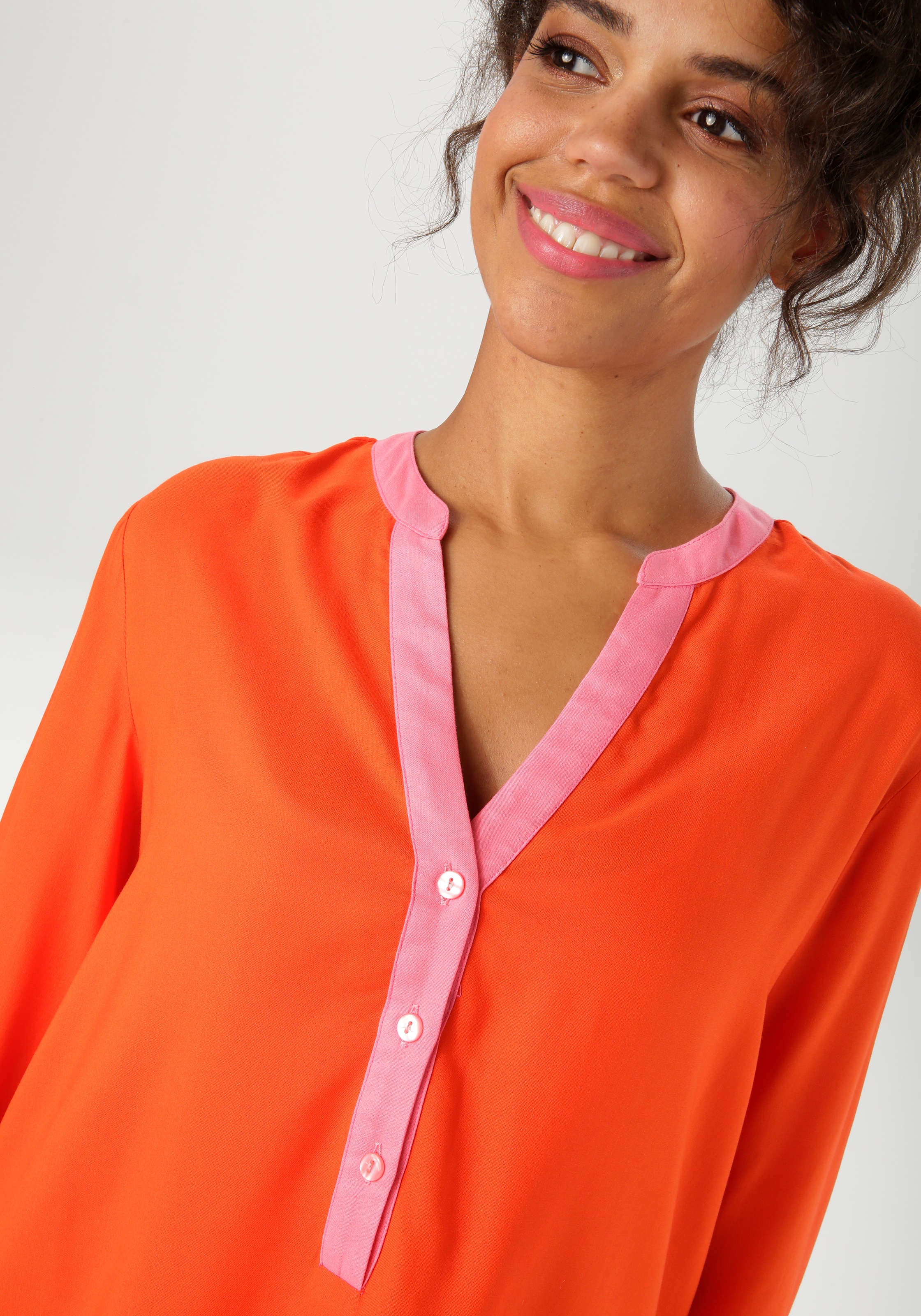 Aniston CASUAL Schlupfbluse, mit pinkfarbenen Akzenten - NEUE KOLLEKTION