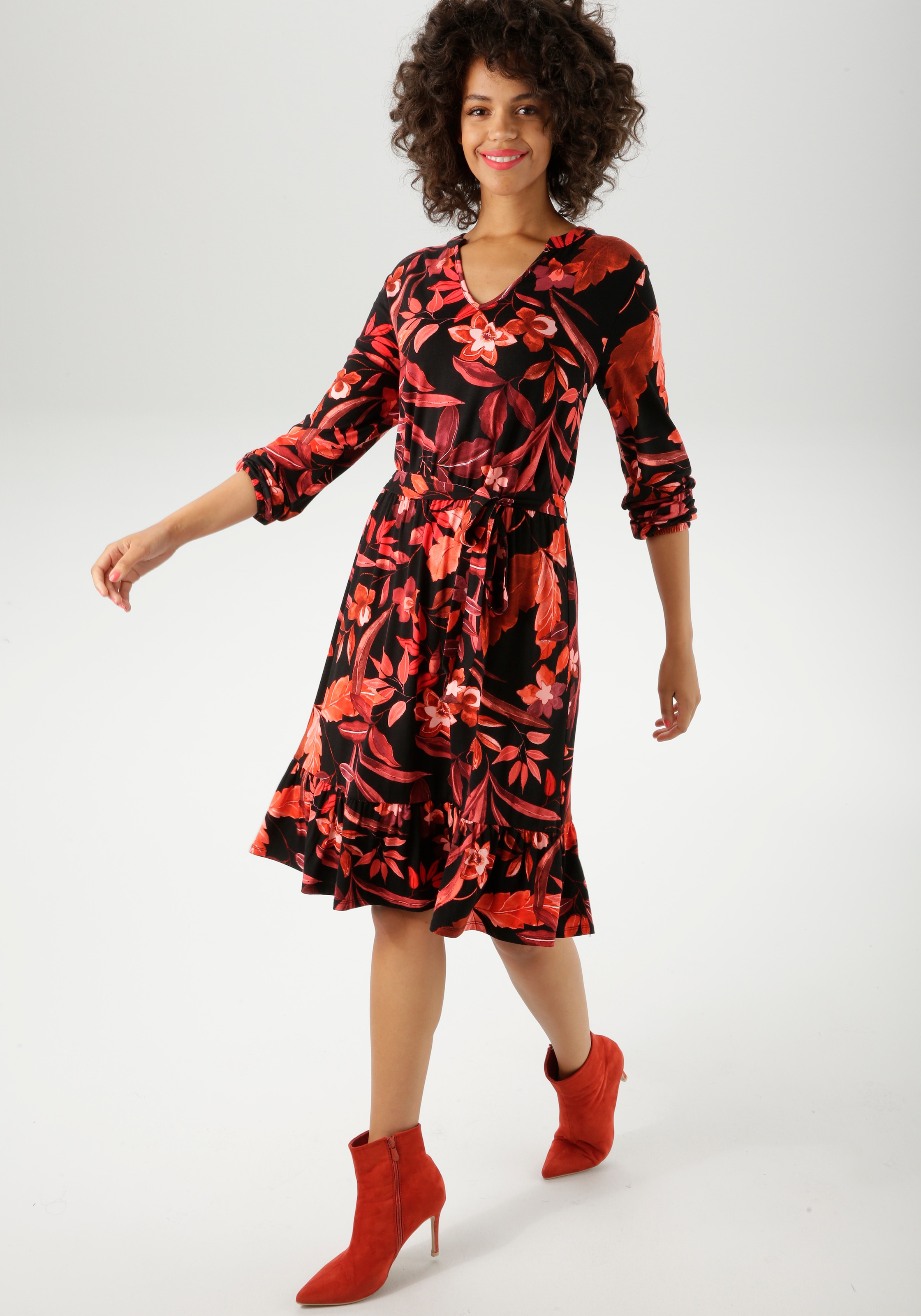 Aniston CASUAL Jerseykleid mit abnehmbarem Bindeband, mit großflächigen Blü günstig online kaufen