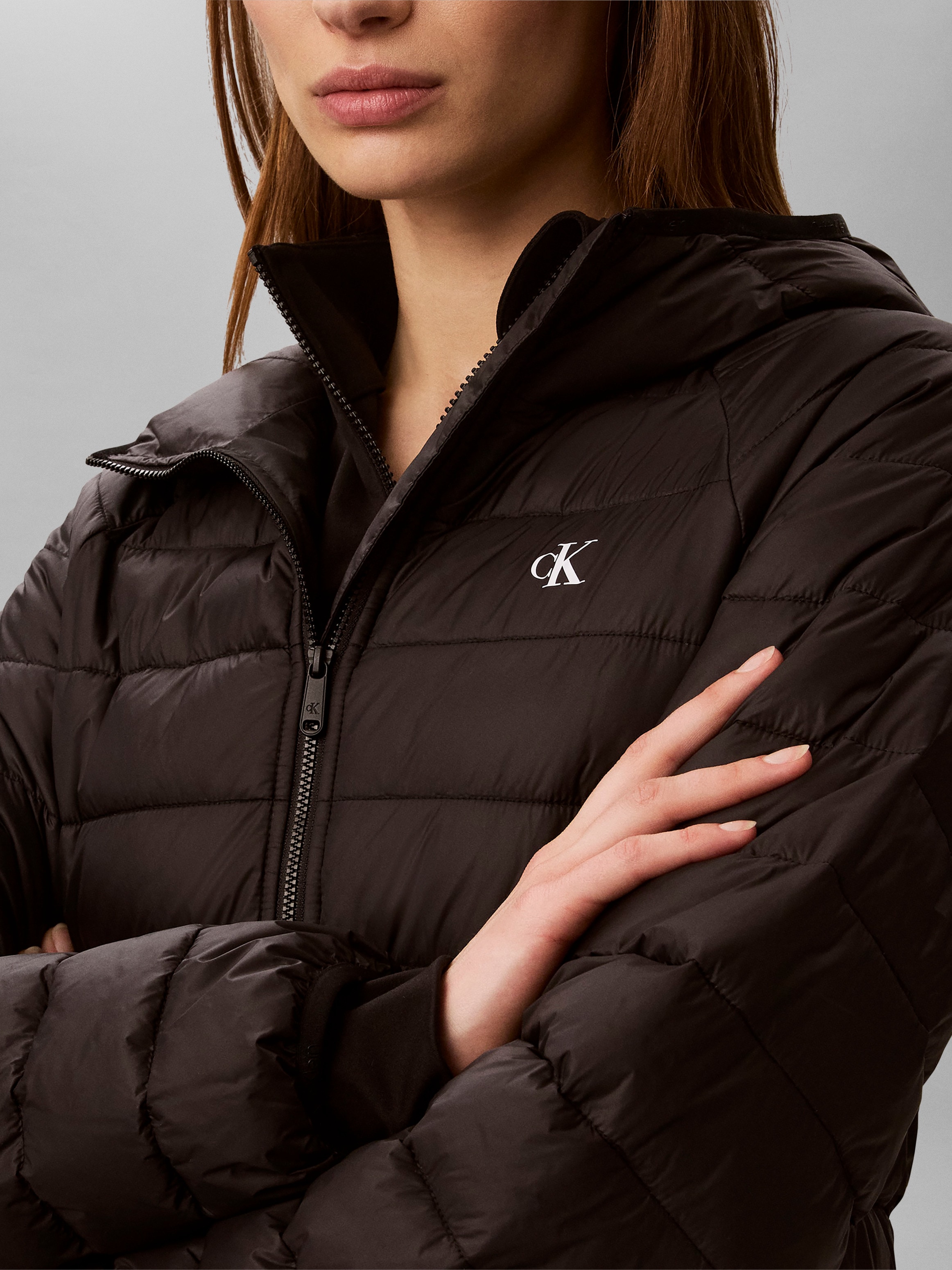 Calvin Klein Jeans Steppjacke »ULW SHORT CK PACKABLE PUFFER JAC« mit Kapuze in kurzer Passform