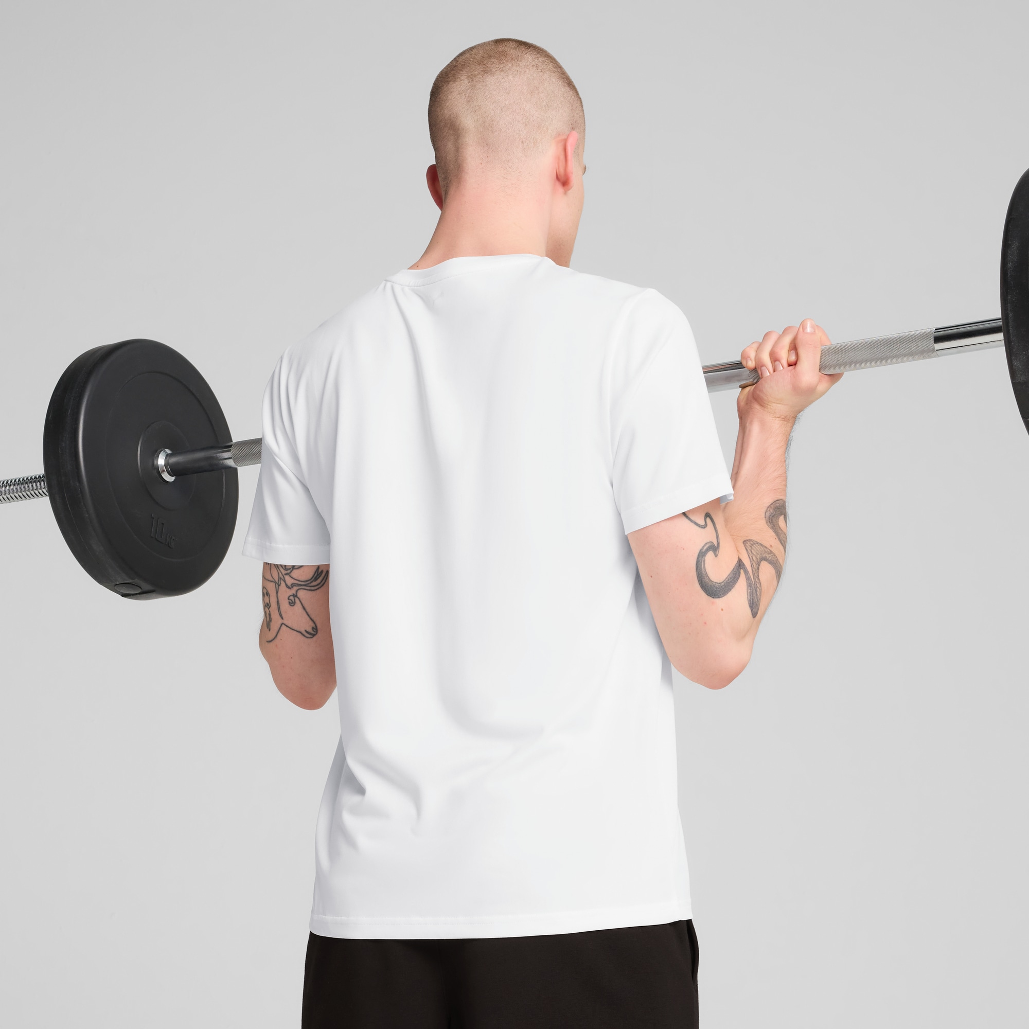PUMA Trainingsshirt »M TAD ESSENTIALS SOLID CAT TEE (LC SMALL CAT)«