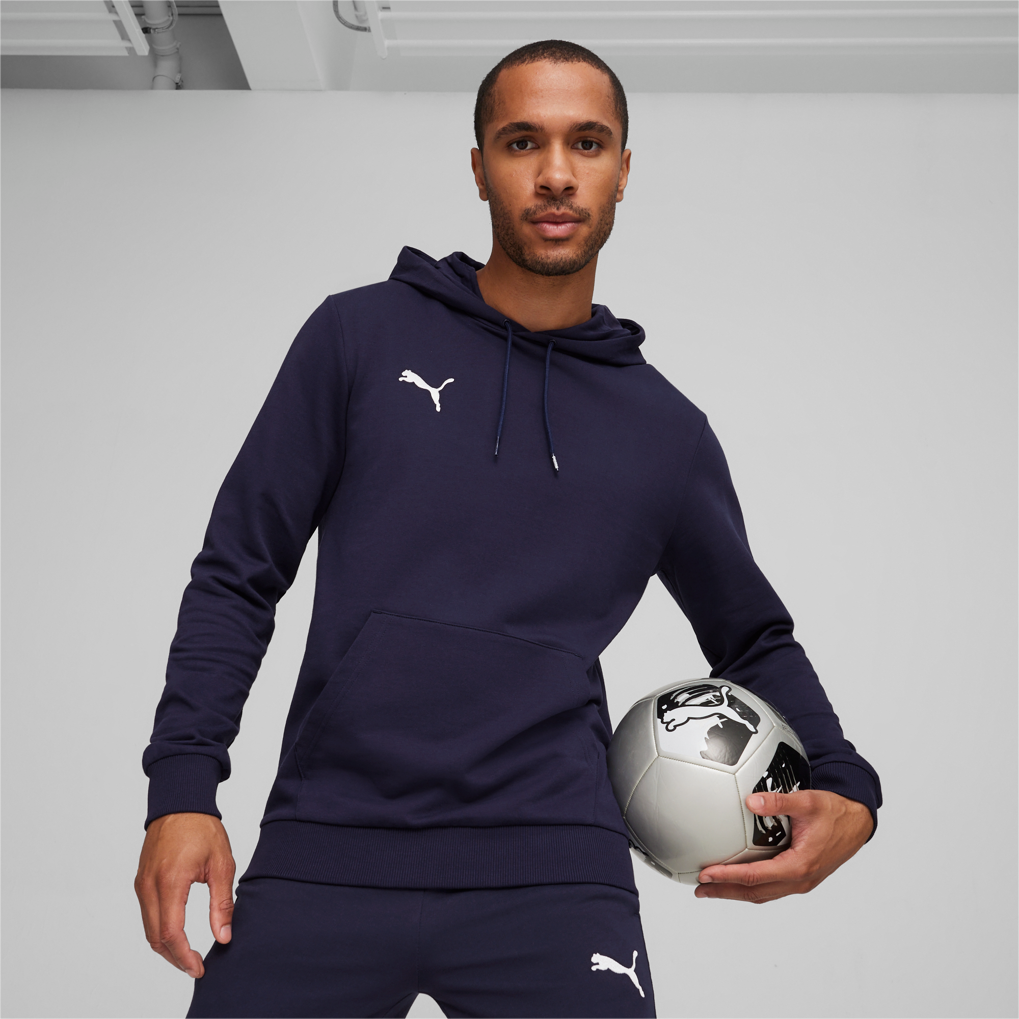 PUMA Kapuzensweatshirt "TEAMGOAL CASUALS HOODY", mit Kapuze, Rundhalsausschnitt, Regular Fit, mit Kängurutasche