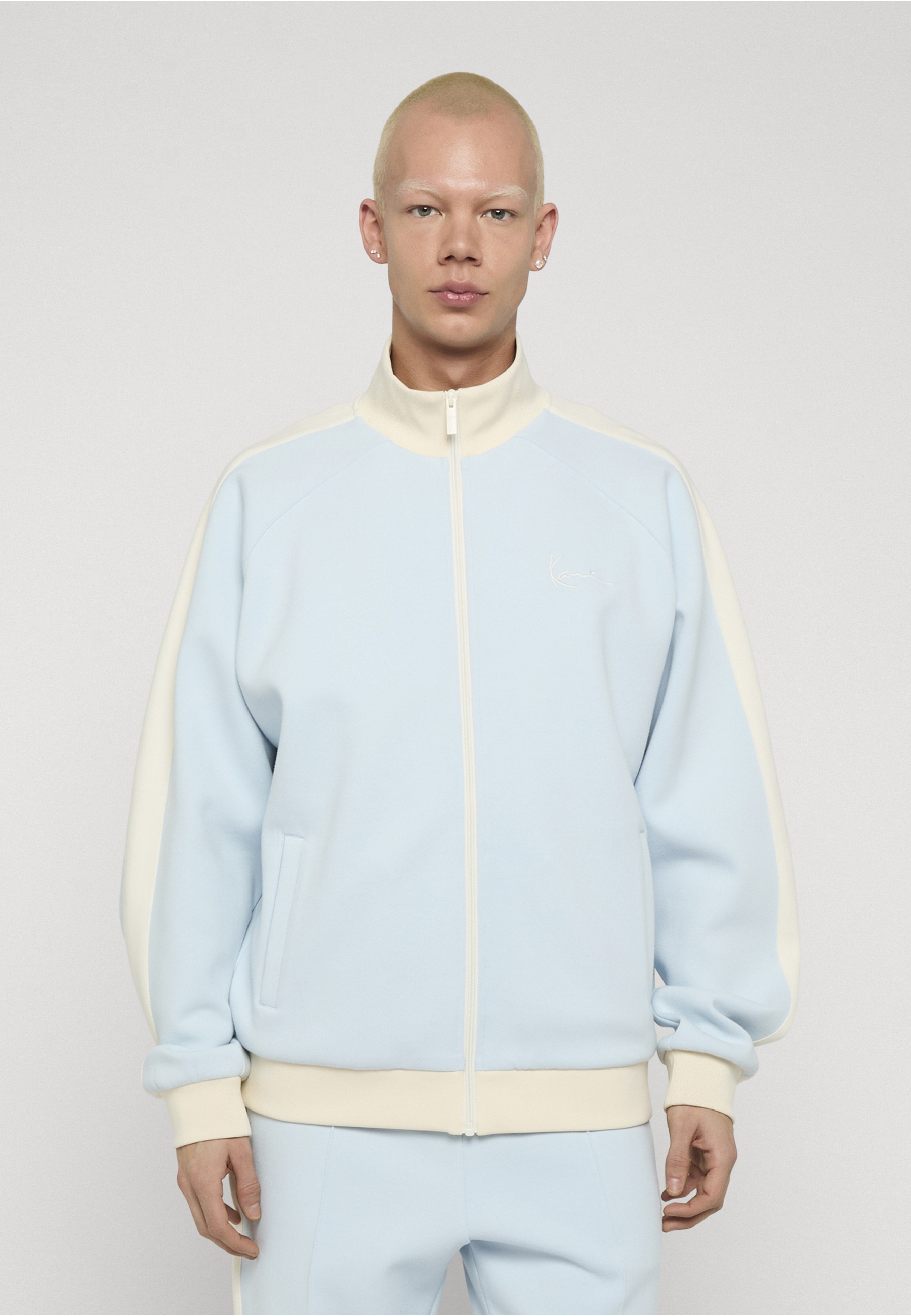 Karl Kani Outdoorjacke »Karl Kani Signature Sidestripe Pique Trackjacket« 1 Stk. tlg. ohne Kapuze