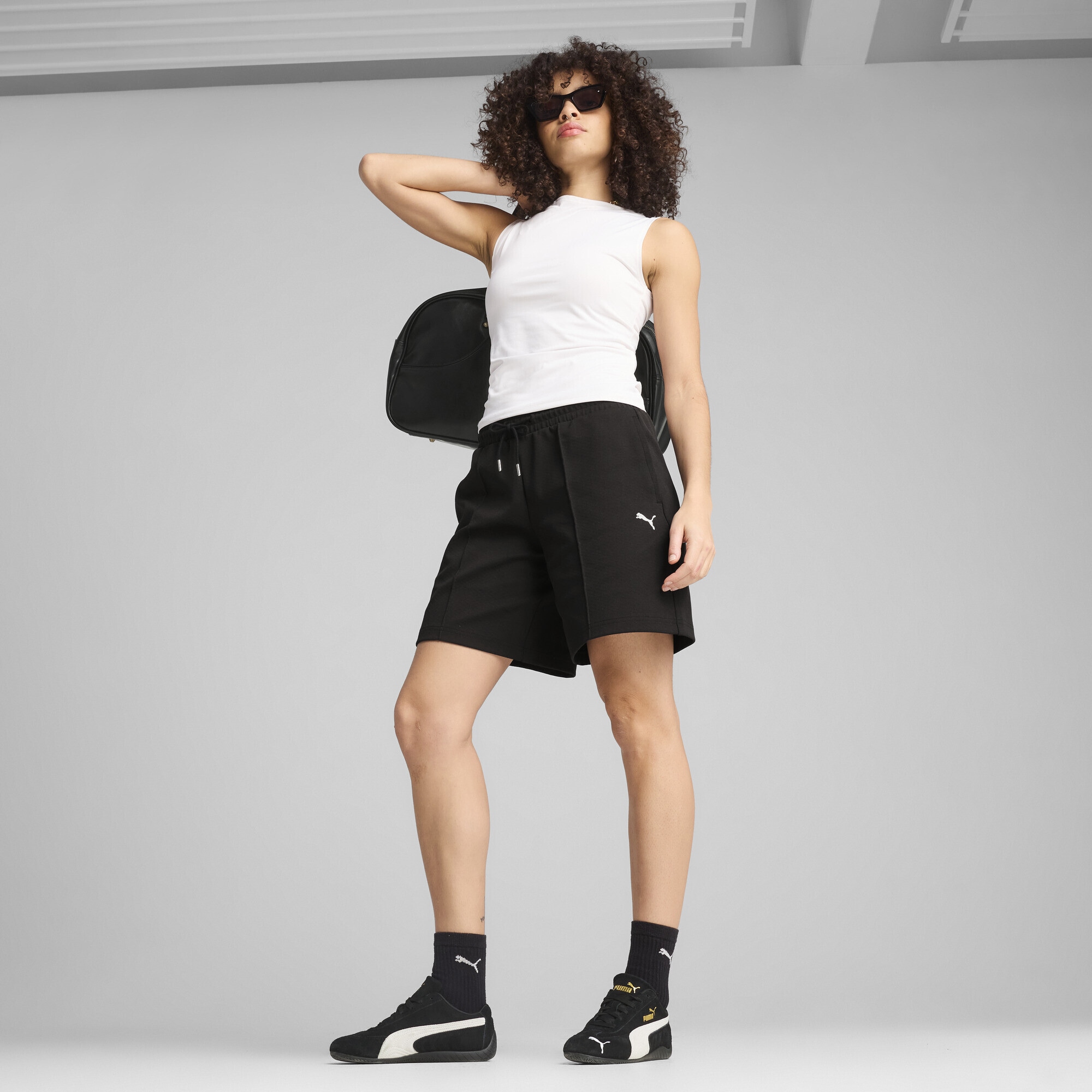 PUMA Sporthose »WARDROBE ESS Lange Relaxed Fit 8" Shorts Damen«