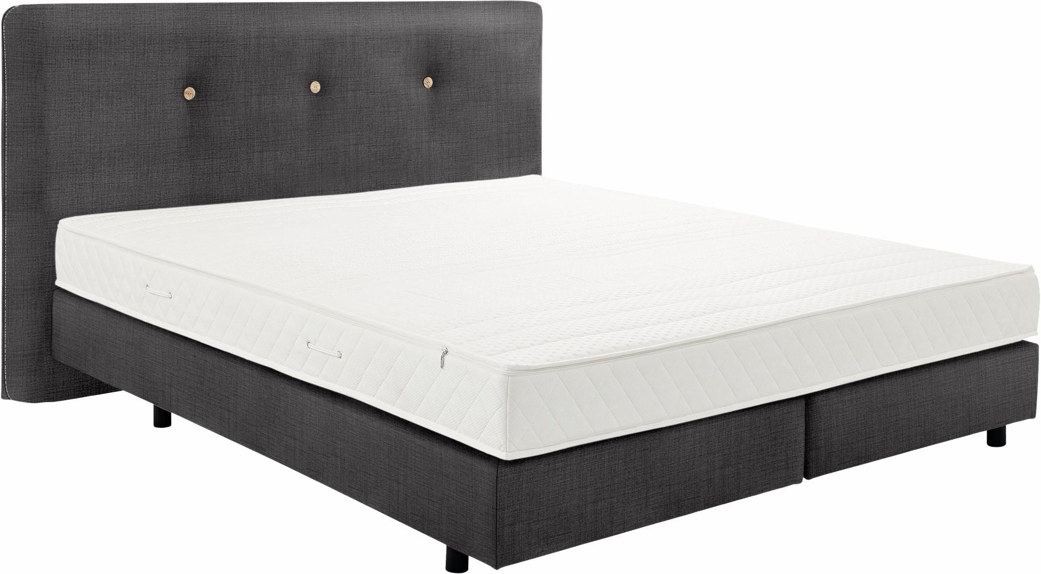now by hülsta Boxspringbett, mit Olivenholz Holzknöpfen im Kopfteil, Flachgewebe mit Leinen
