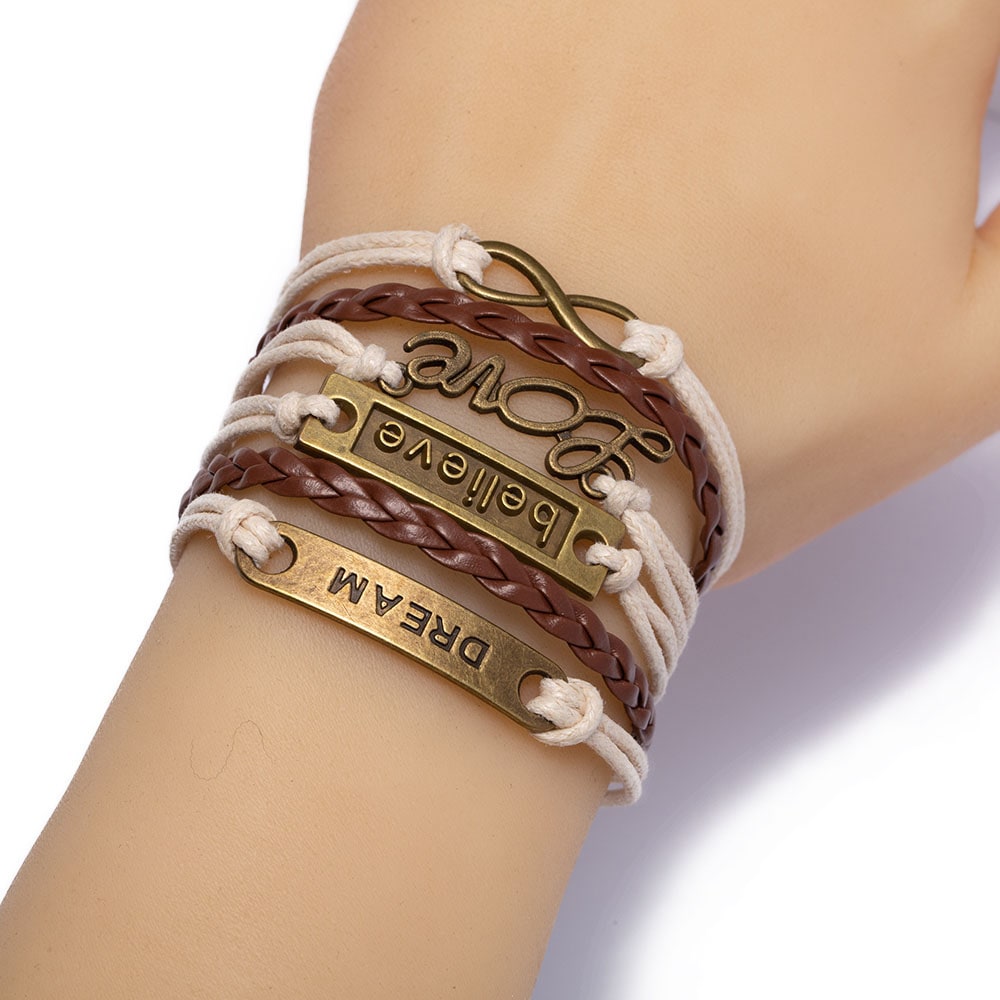 Firetti Armband »Schmuck Messing Leder DREAM believe Love Infinity Unendlichkeit«, Made in Germany