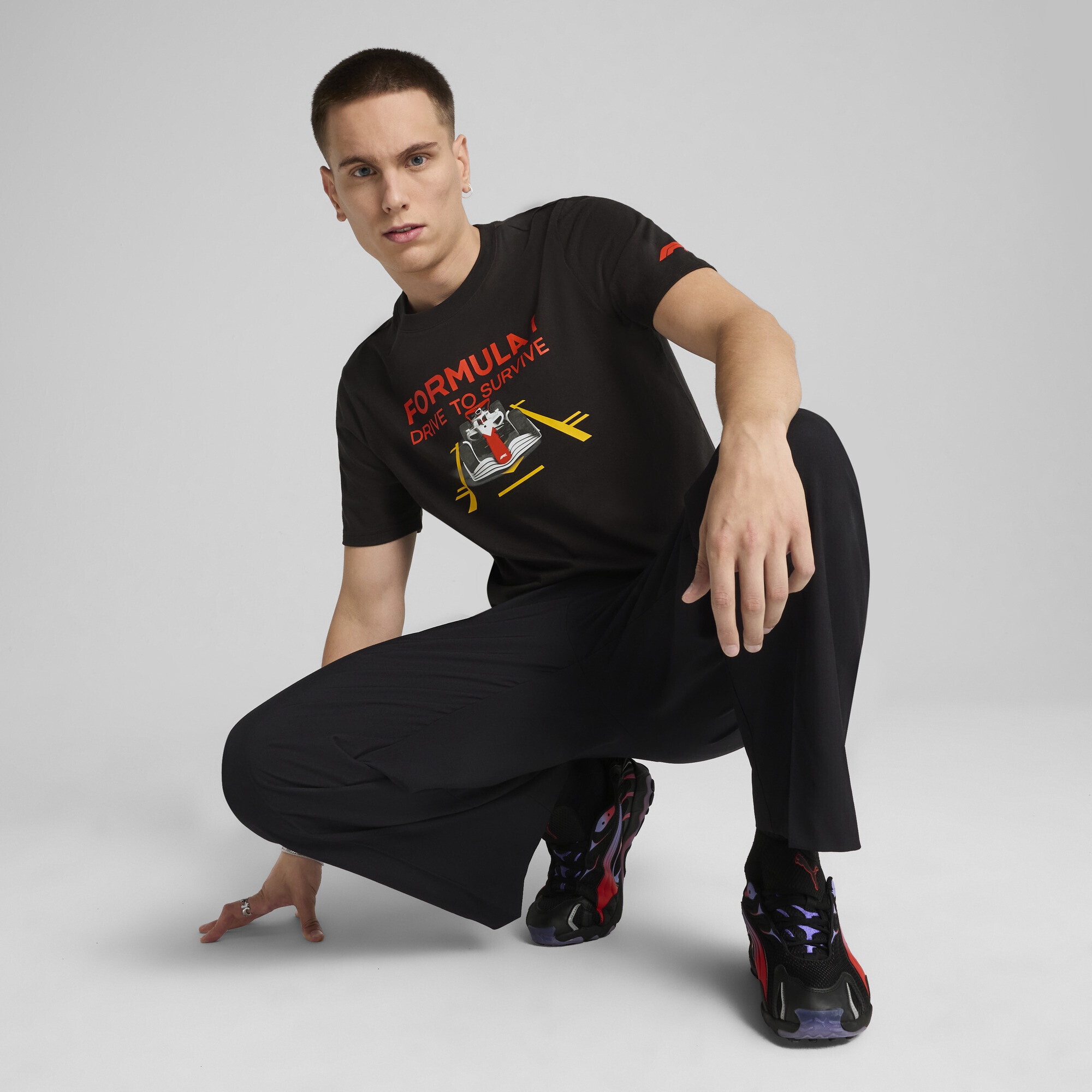 PUMA T-Shirt »F1® Drive to Survive Graphic Race T-Shirt Erwachsene«
