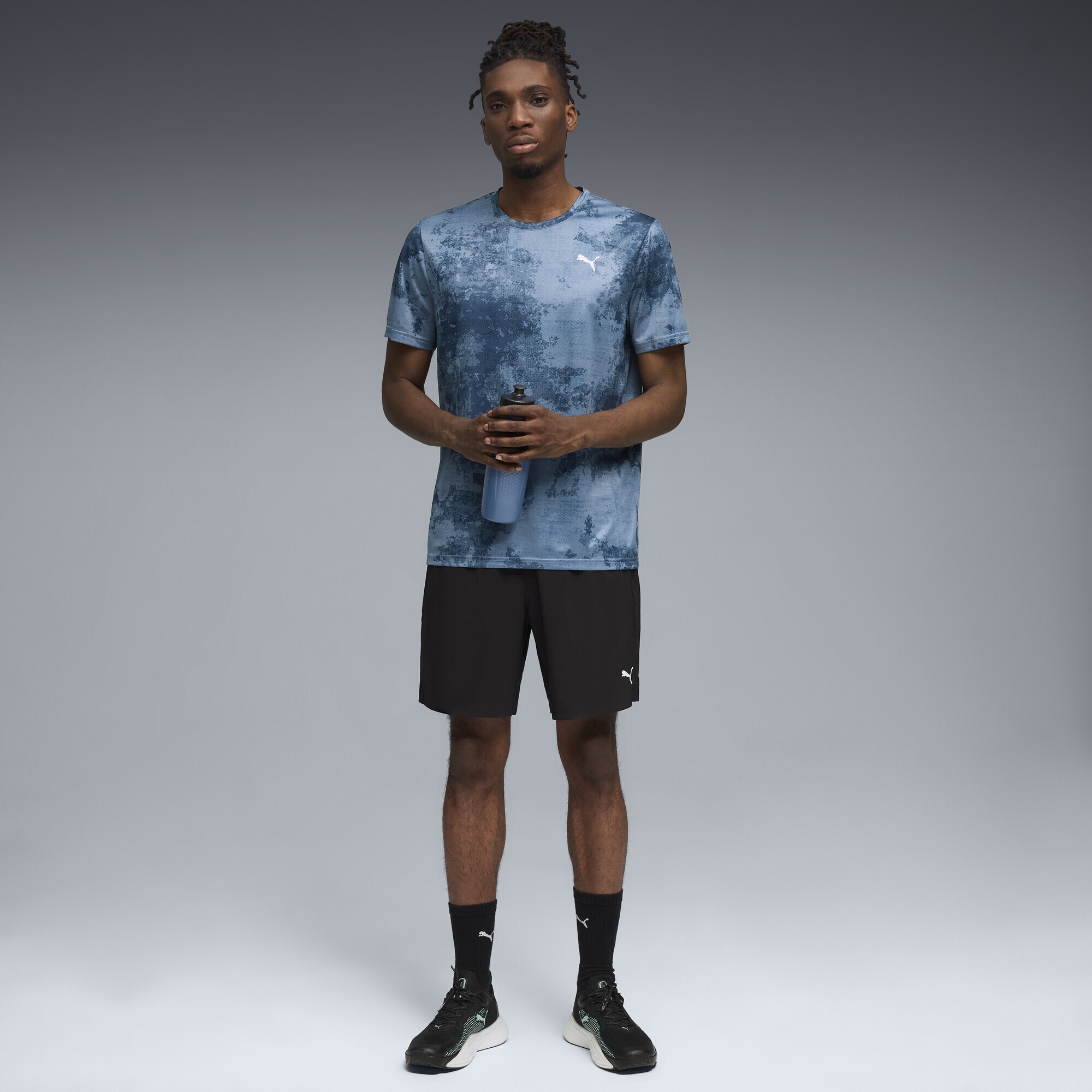 PUMA Trainingsshirt »TAD ESSENTIALS AOP T-Shirt Herren«