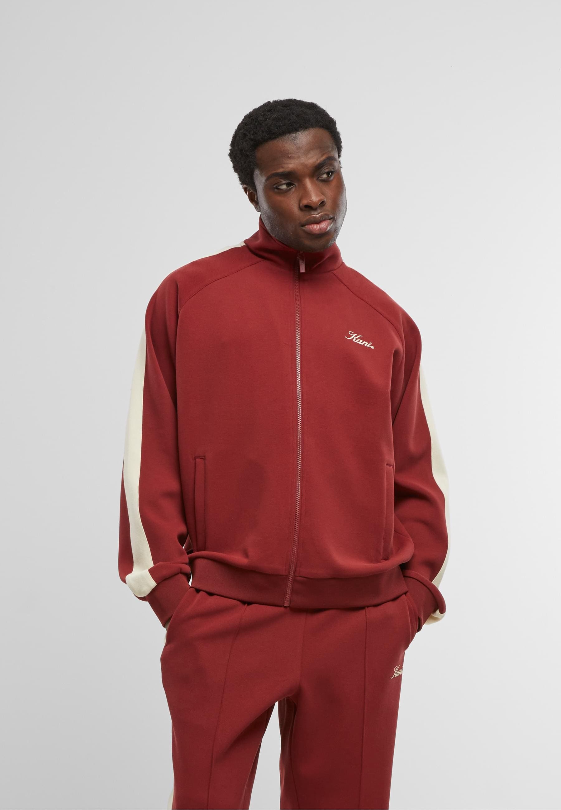 Karl Kani Trainingsjacke »Karl Kani Kani Sidestripe Trackjacket«, (1 St.), ohne Kapuze