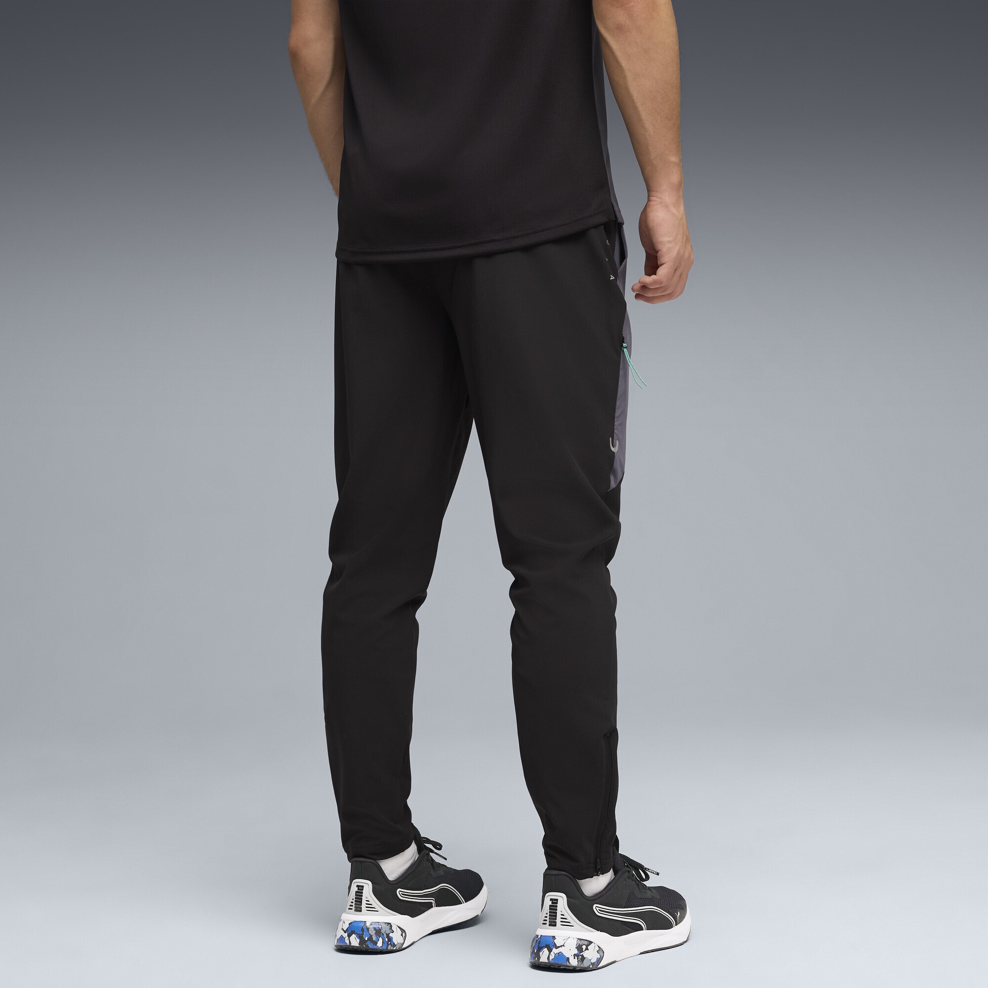 PUMA Trainingshose »FLEX STRETCH Gewebte Trainingshose Herren«