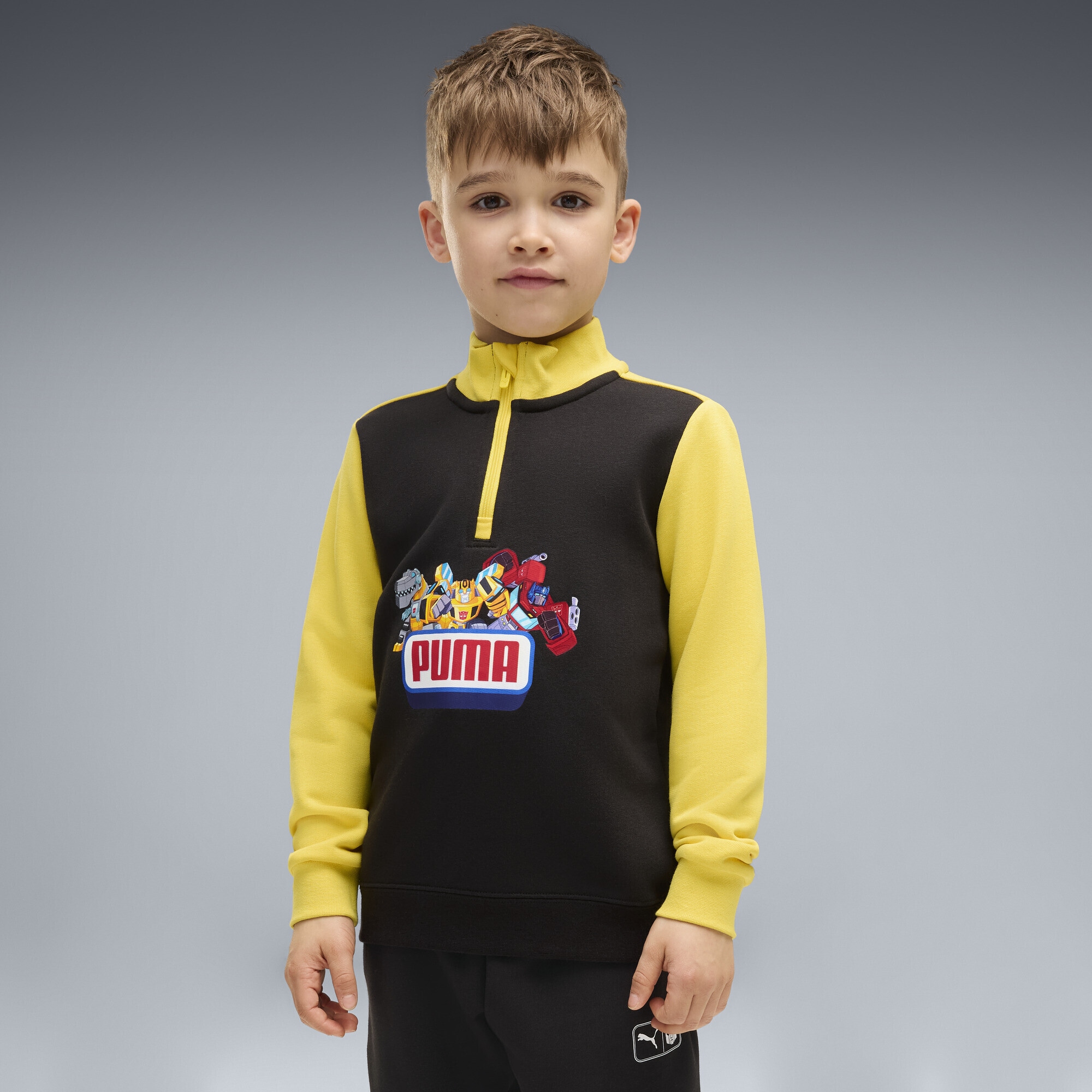 PUMA Rundhalspullover »PUMA x TRANSFORMERS Graphic Sweatshirt mit Reißverschluss bis«