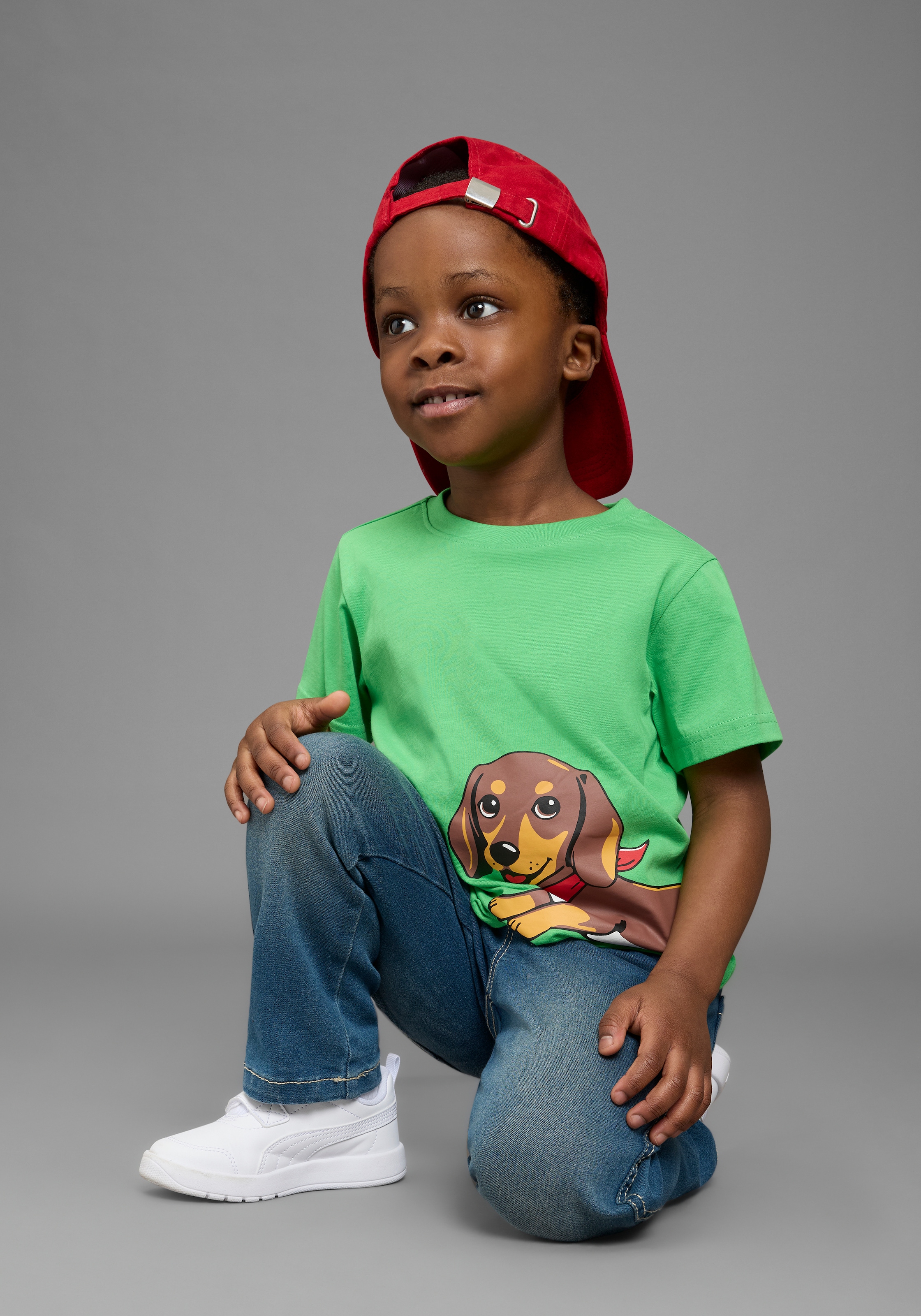 KIDSWORLD T-Shirt »Shirt mit rundum Dackel-Print« Basic Passform, Kurzarm, bedruckte Optik, aus Baumwolle