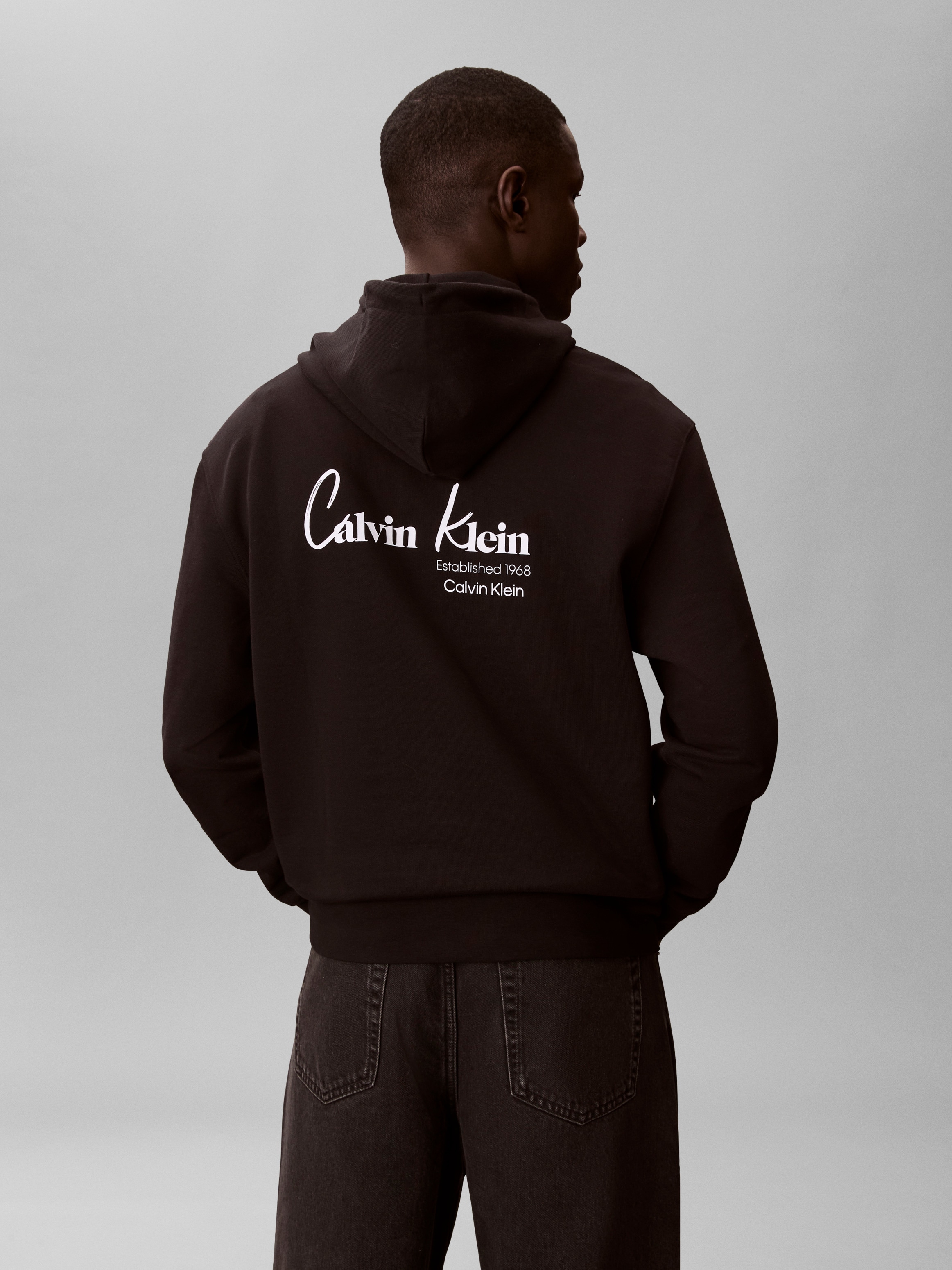 Calvin Klein Jeans Kapuzensweatshirt »GRAPHIC HOODIE«, Regular fit mit Markenprint

