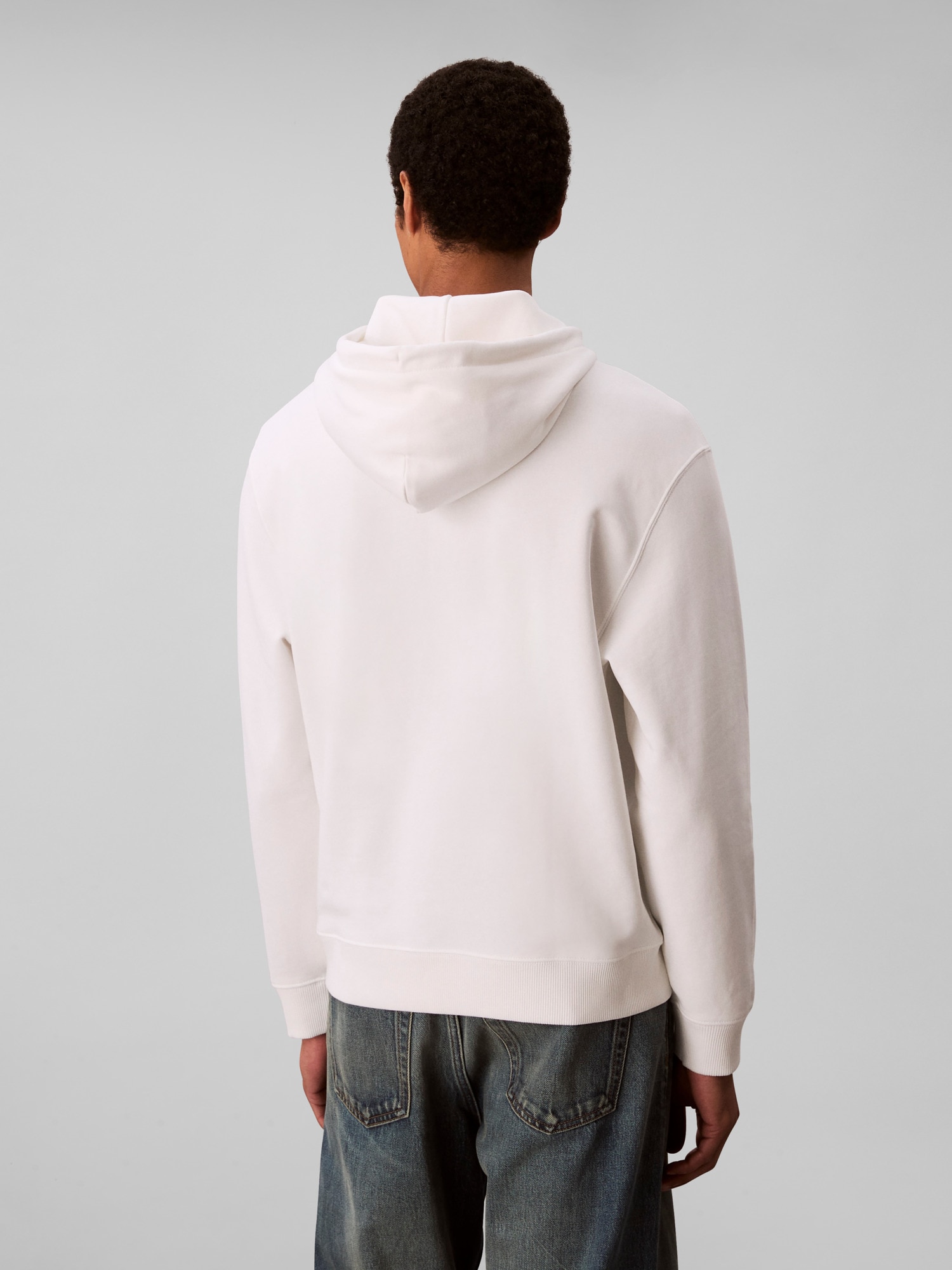 Calvin Klein Jeans Kapuzensweatshirt »LS EU 350TERRY CKNY BOX GRAPHIC«, Mit Rundhalsausschnitt, regular fit