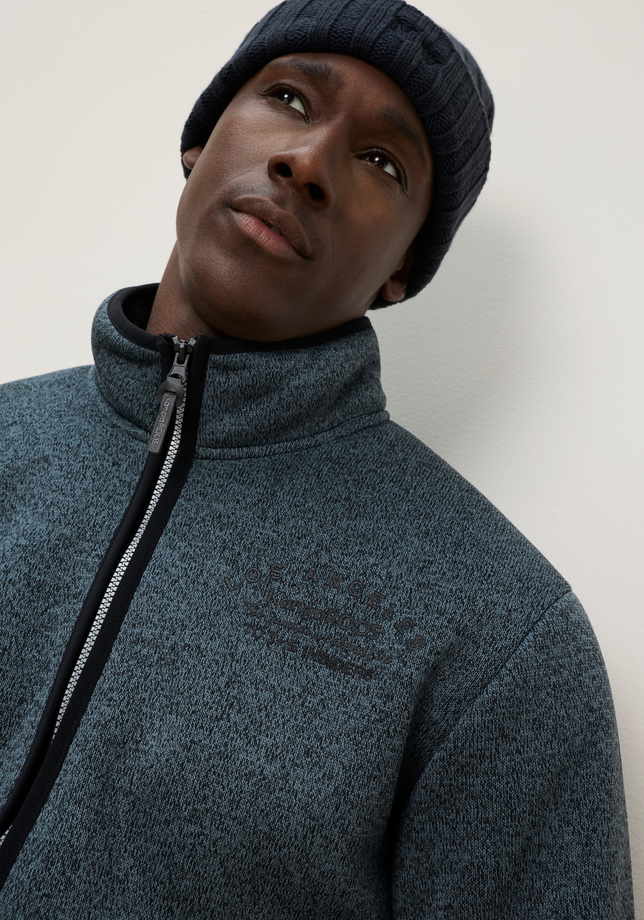 KangaROOS Strickfleecejacke mit durchgehendem Reißverschluss, po-bedeckende Länge