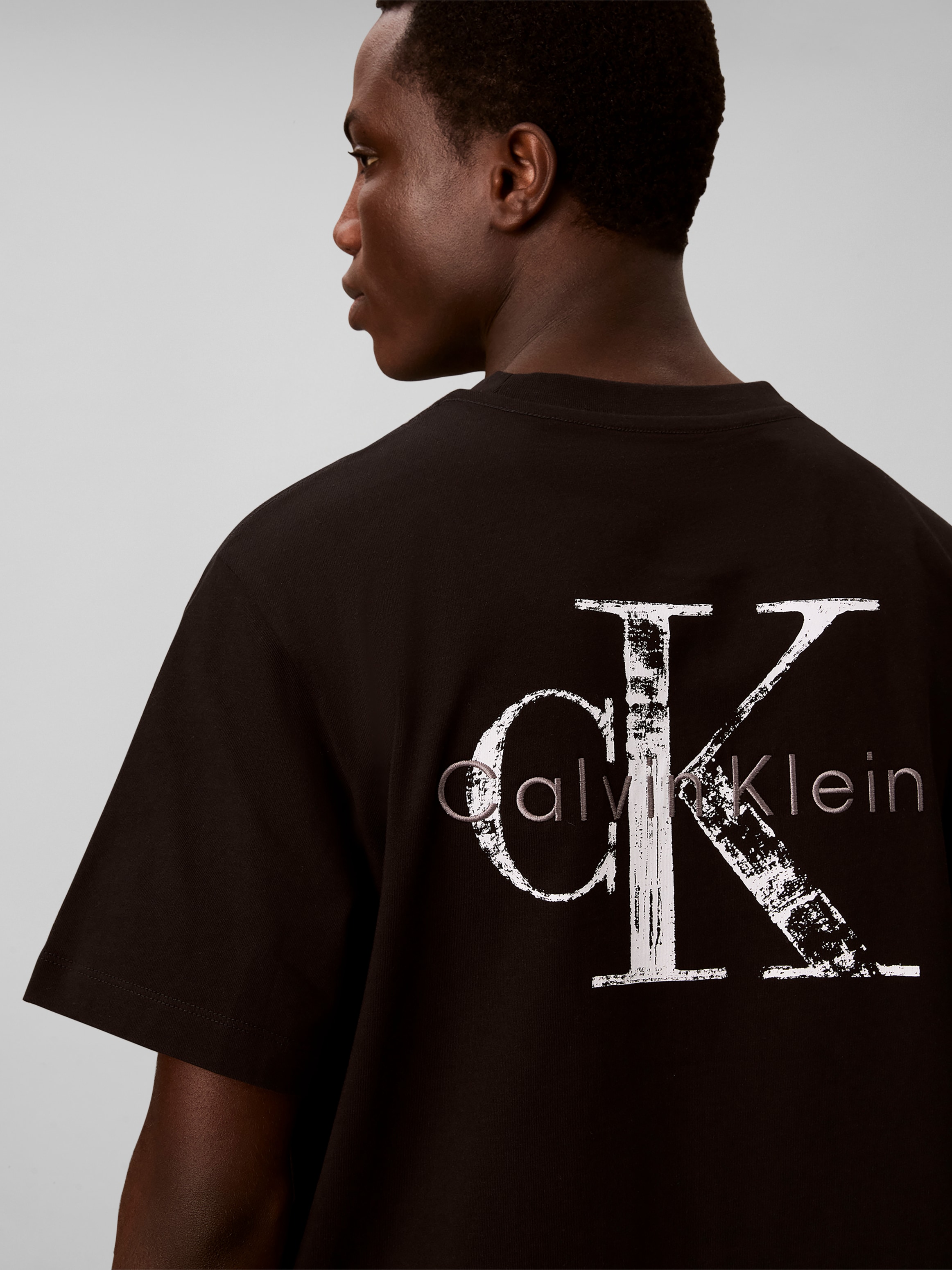 Calvin Klein T-Shirt »DISTRESS MONOLOGO« Regular fit mit Rückenprint
