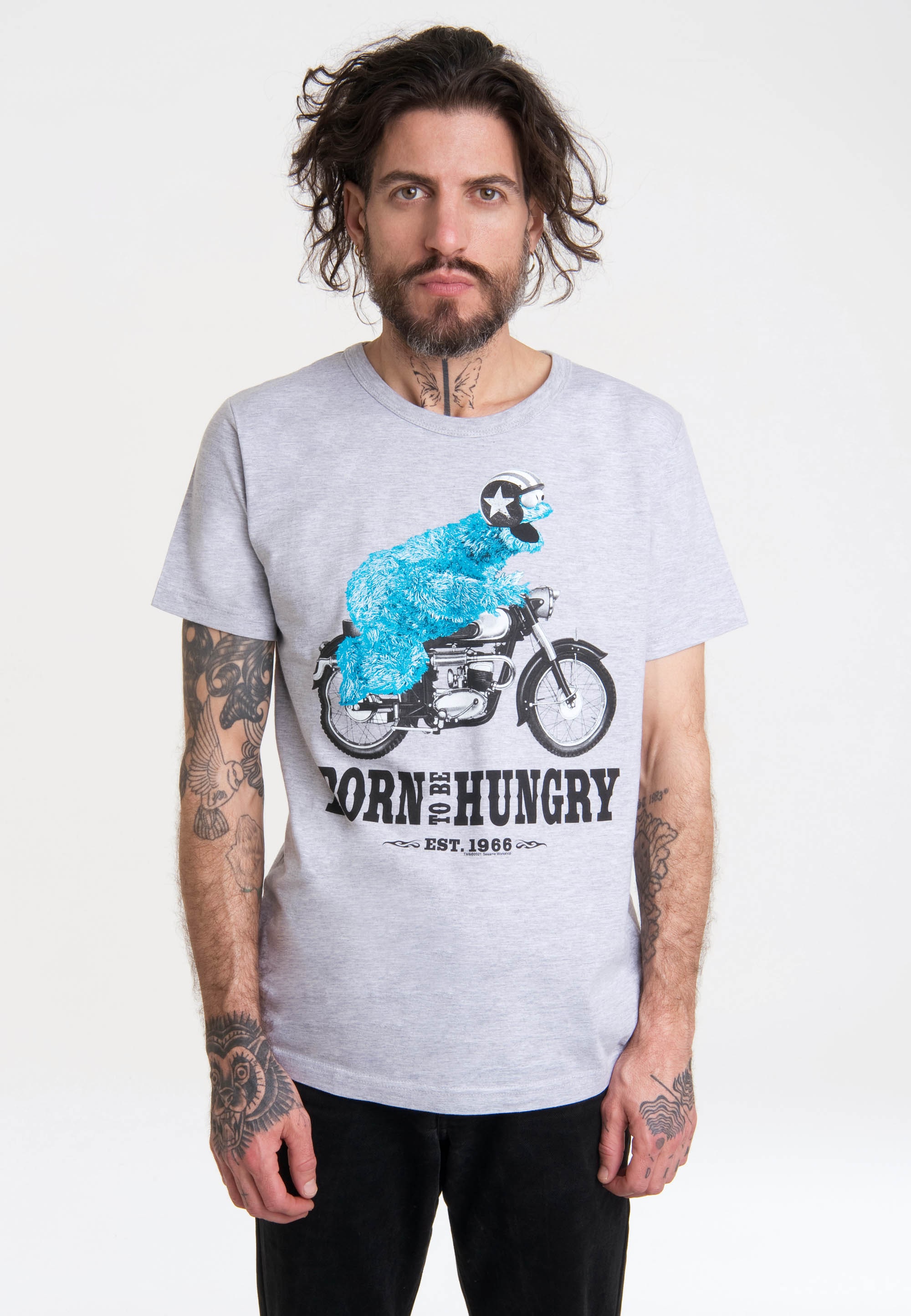 lizenziertem ▷ Motorrad«, | mit »Sesamstrasse BAUR Print LOGOSHIRT bestellen Krümelmonster T-Shirt -