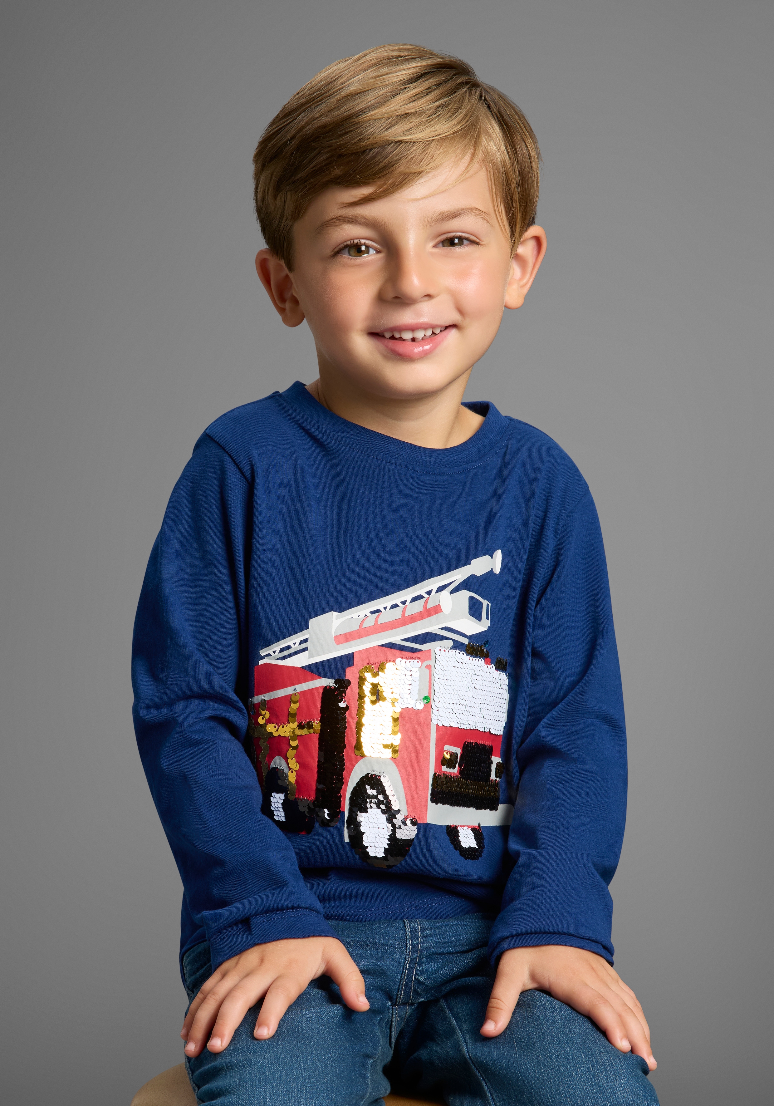 KIDSWORLD Langarmshirt "Feuerwehr Pailletten Shirt" Shirt mit Feuerwehr Wende-Pailletten
