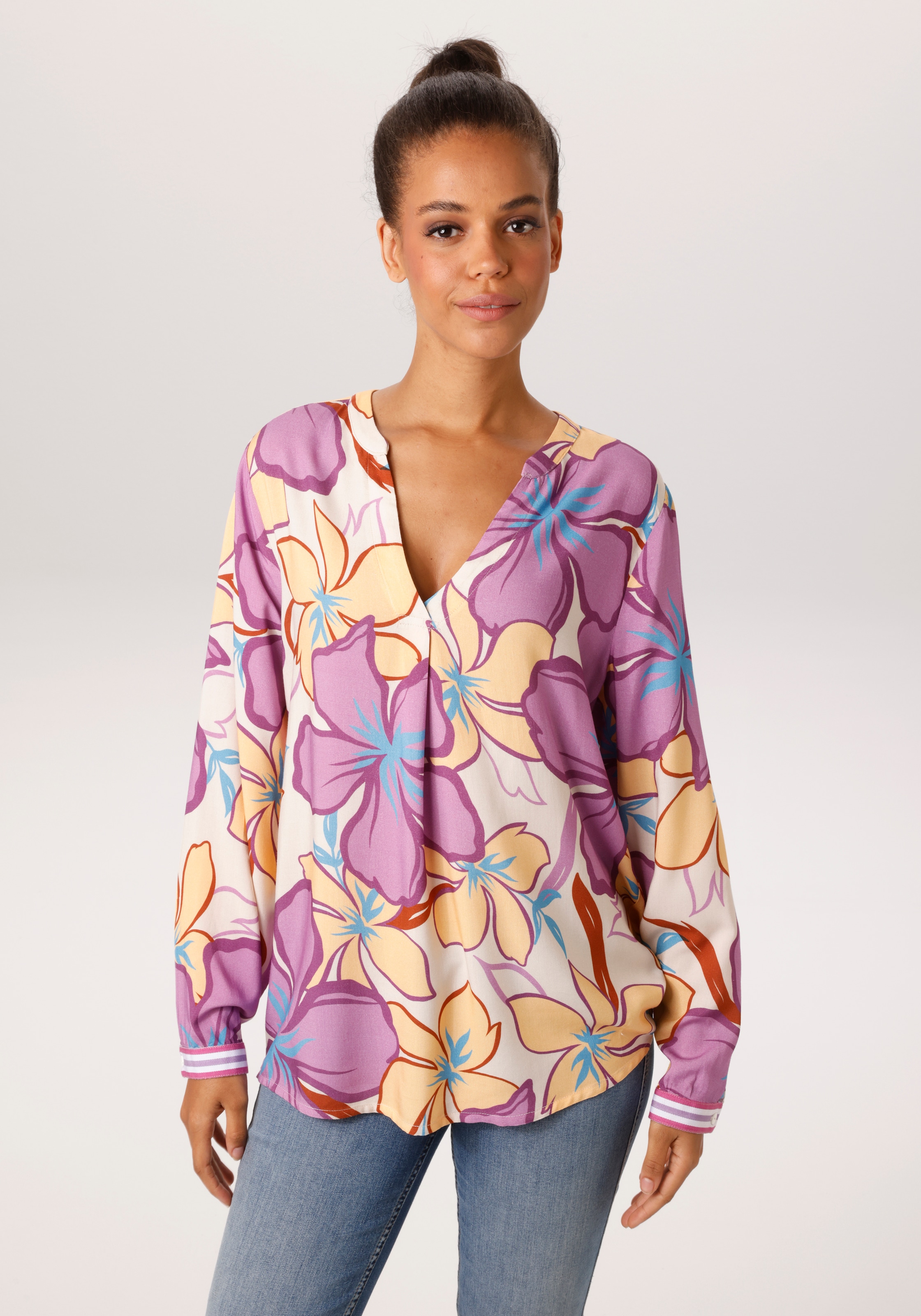 Aniston CASUAL Schlupfbluse mit farbenfrohen, großflächigen Blüten bedruckt günstig online kaufen