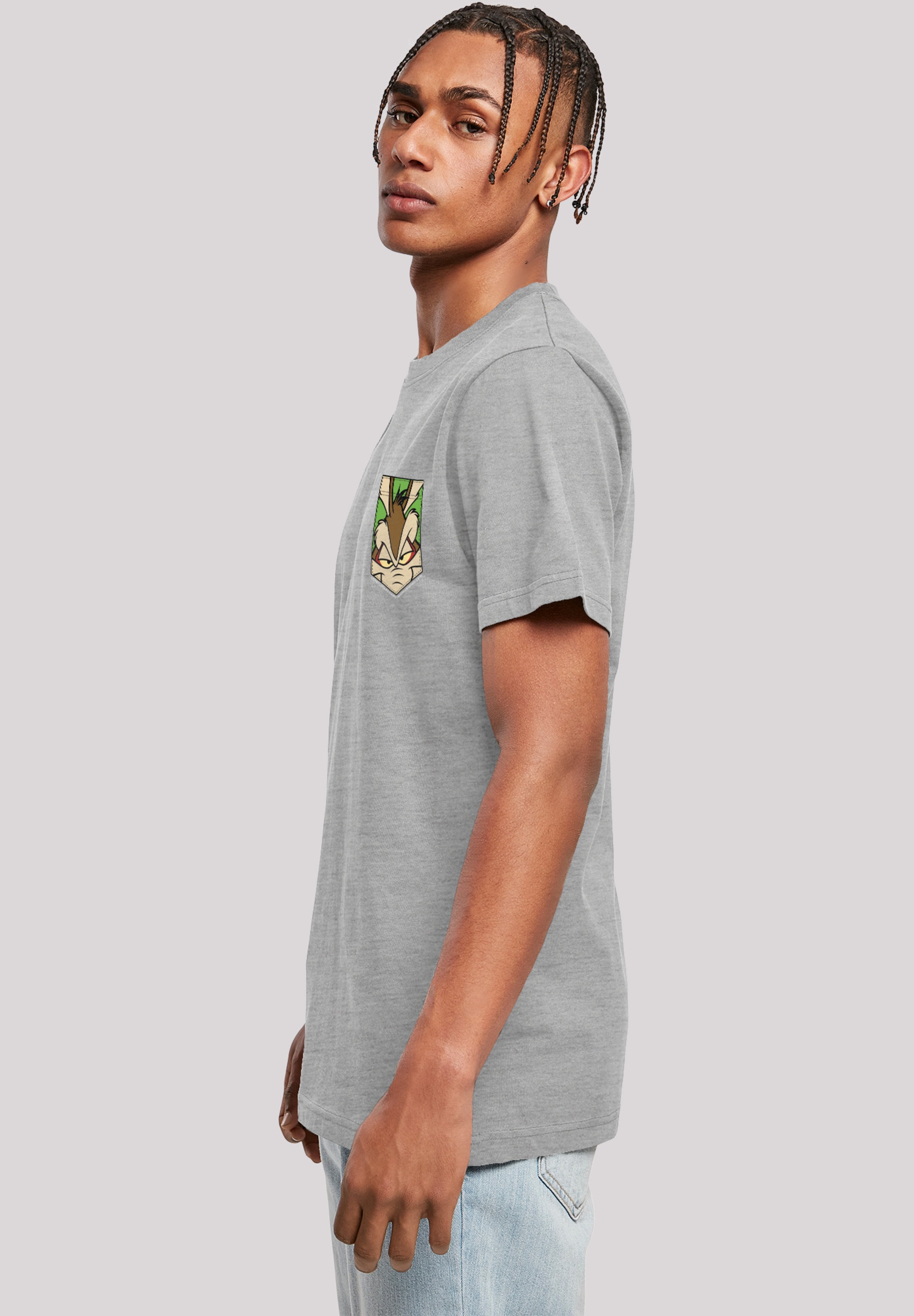 F4NT4STIC T-Shirt »Looney Tunes Face Faux Pocket«, Print